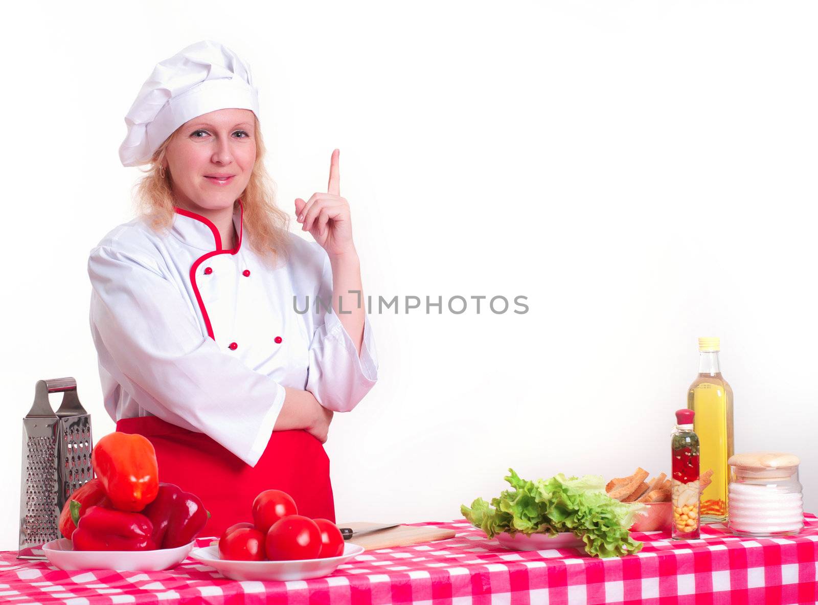Portrait of attractive cook woman, with a raised finger