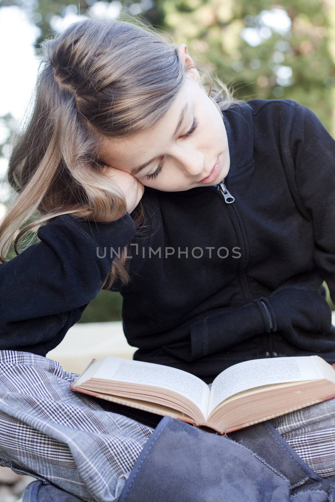 Girl reading book by annems