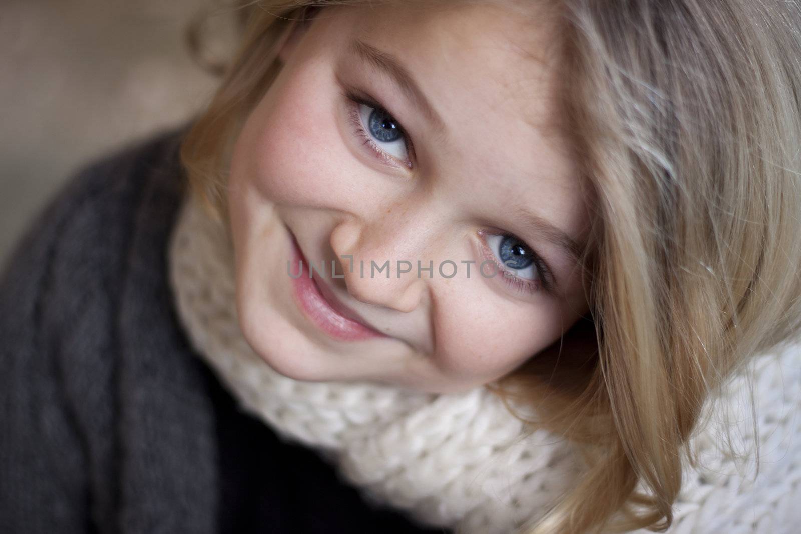 Portrait of a girl smiling at the camera by annems