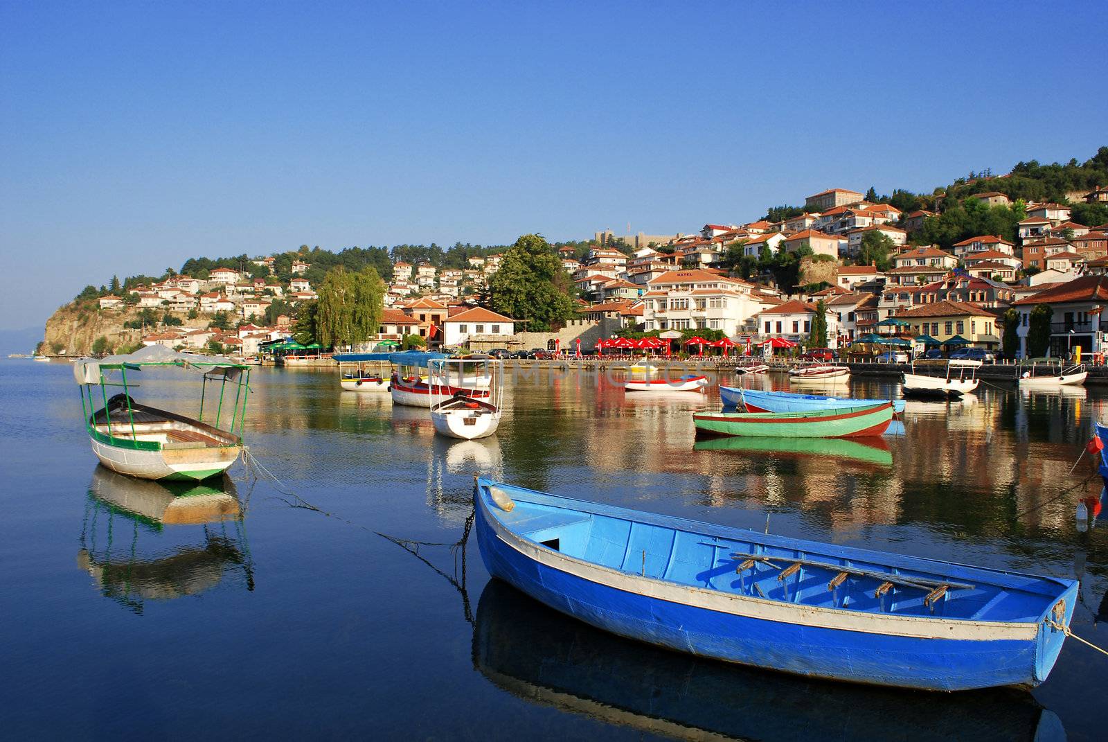 Ohrid lake. Fishing boats with the view of an old town of Ohrid in the background.