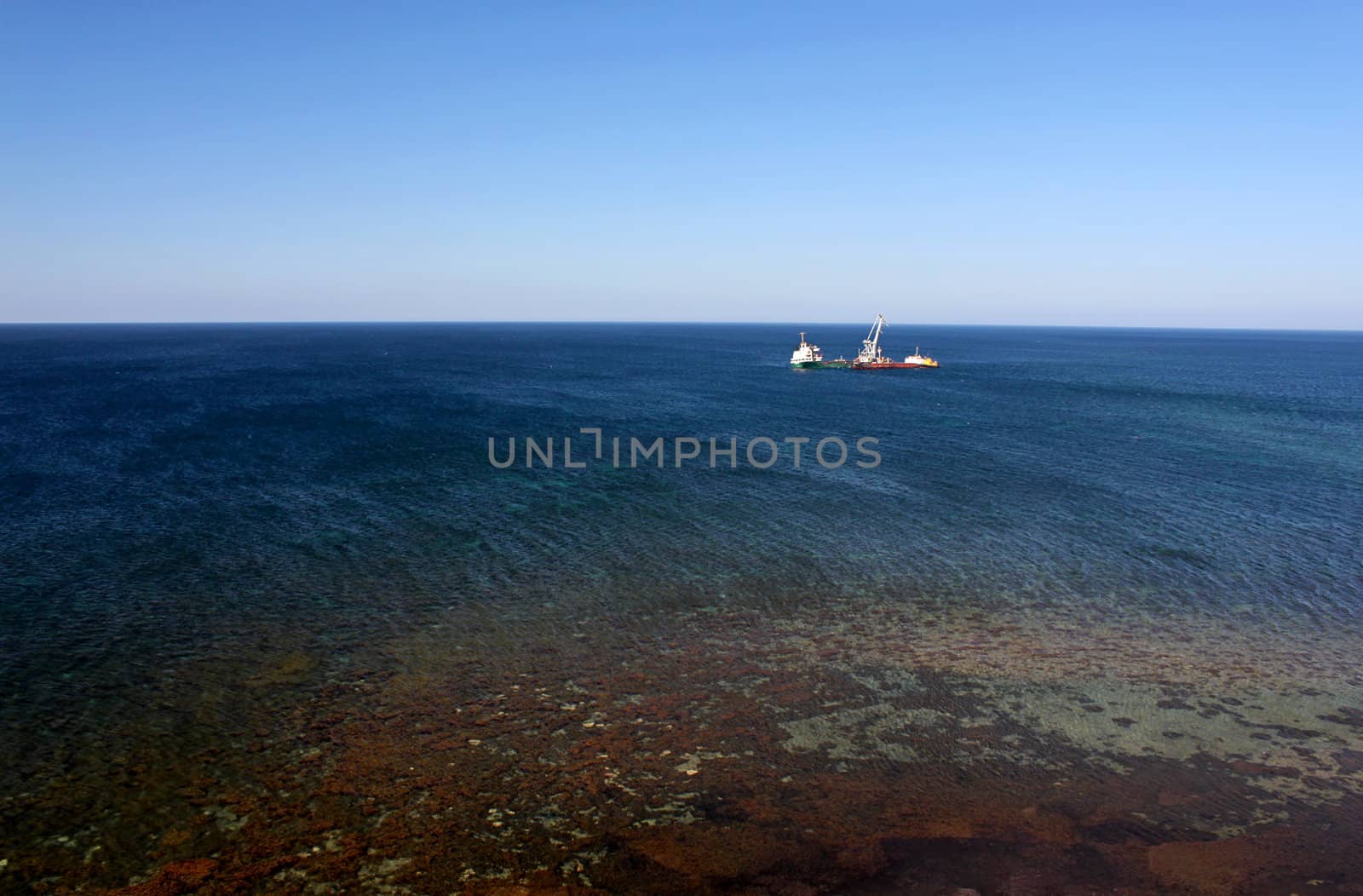 view on sea with ship run aground