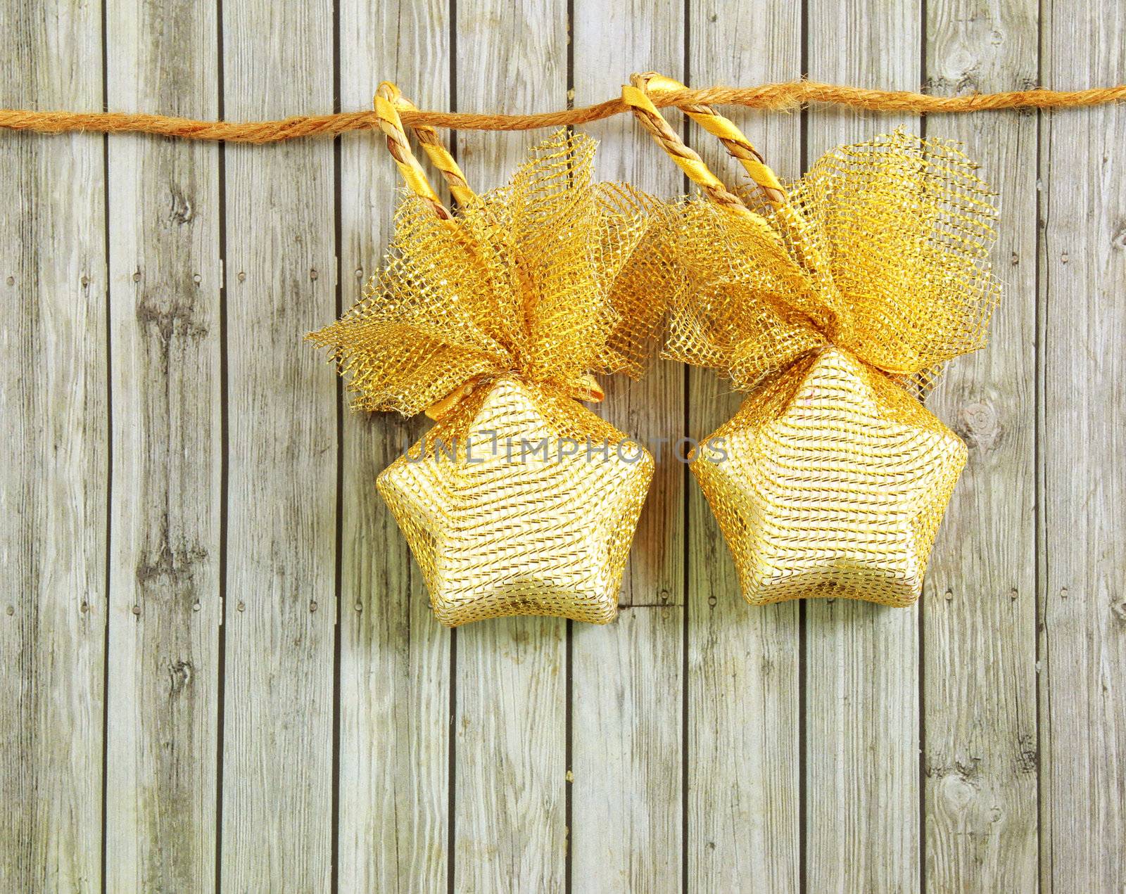 Christmas decoration hanging over wooden background 