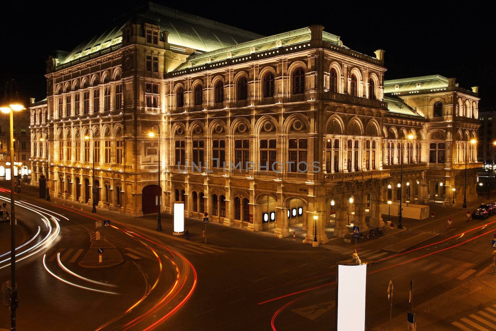 The Vienna Opera house at night in Vienna, Austria