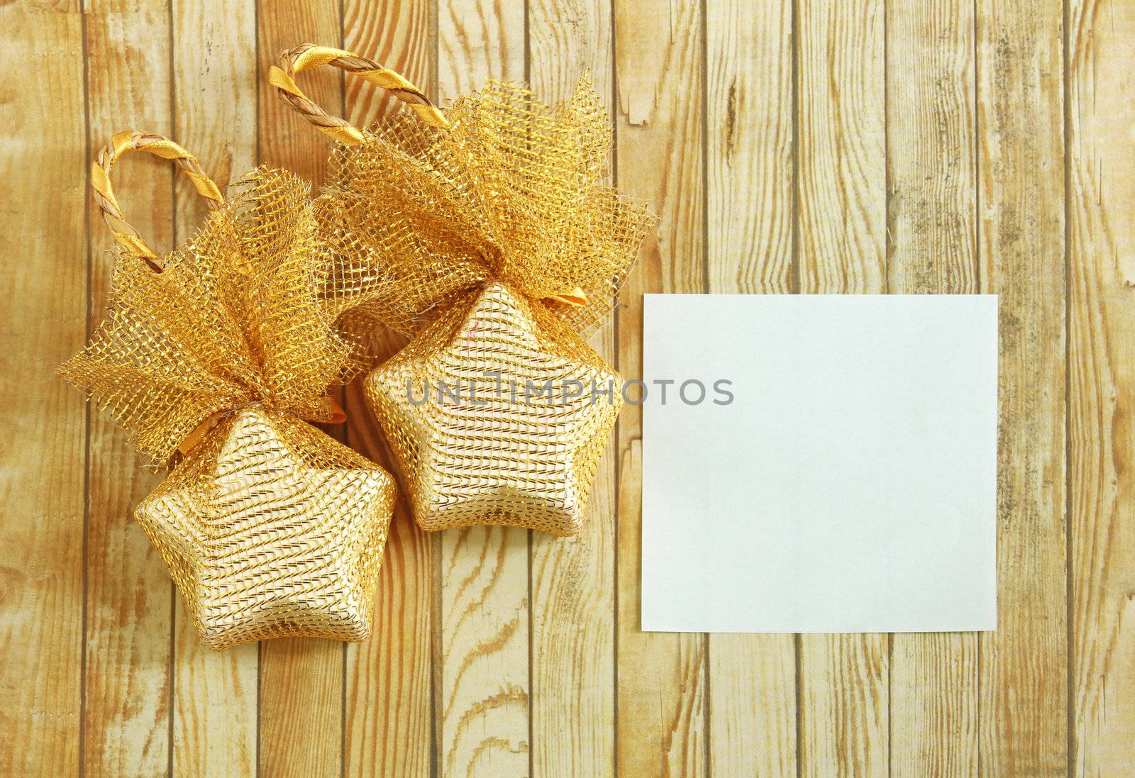 Christmas decoration with blank notebook over wooden background  by nuchylee