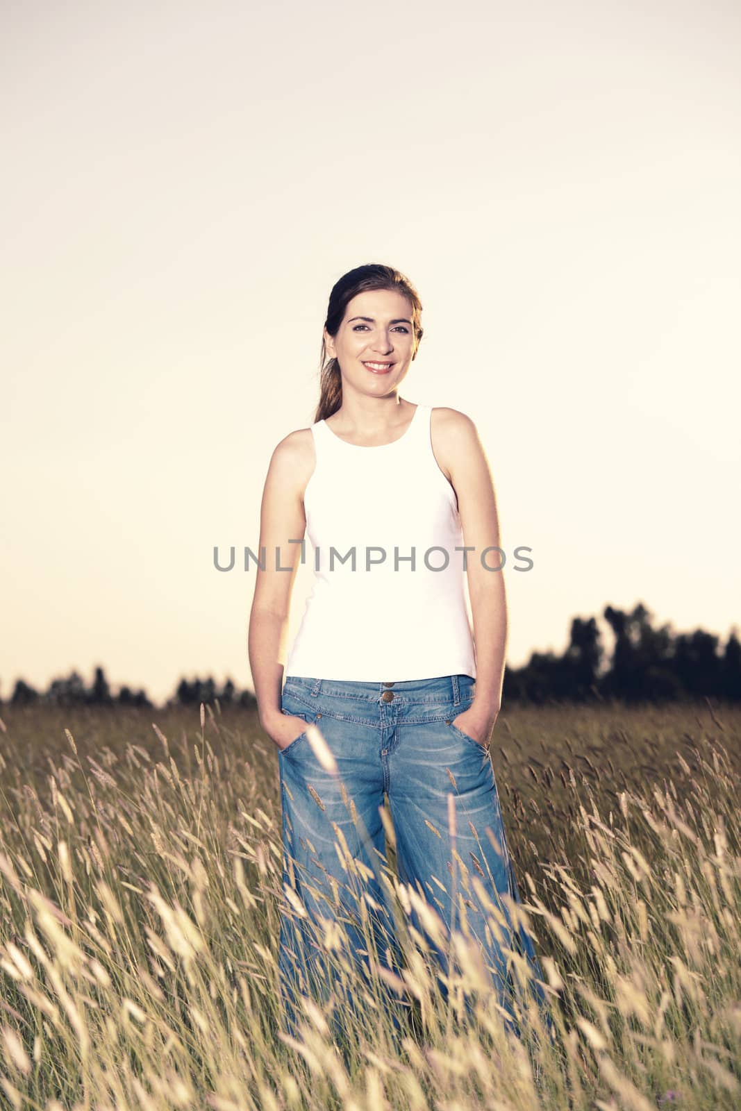Outdoor portrait of a beautiful woman on a summer day
