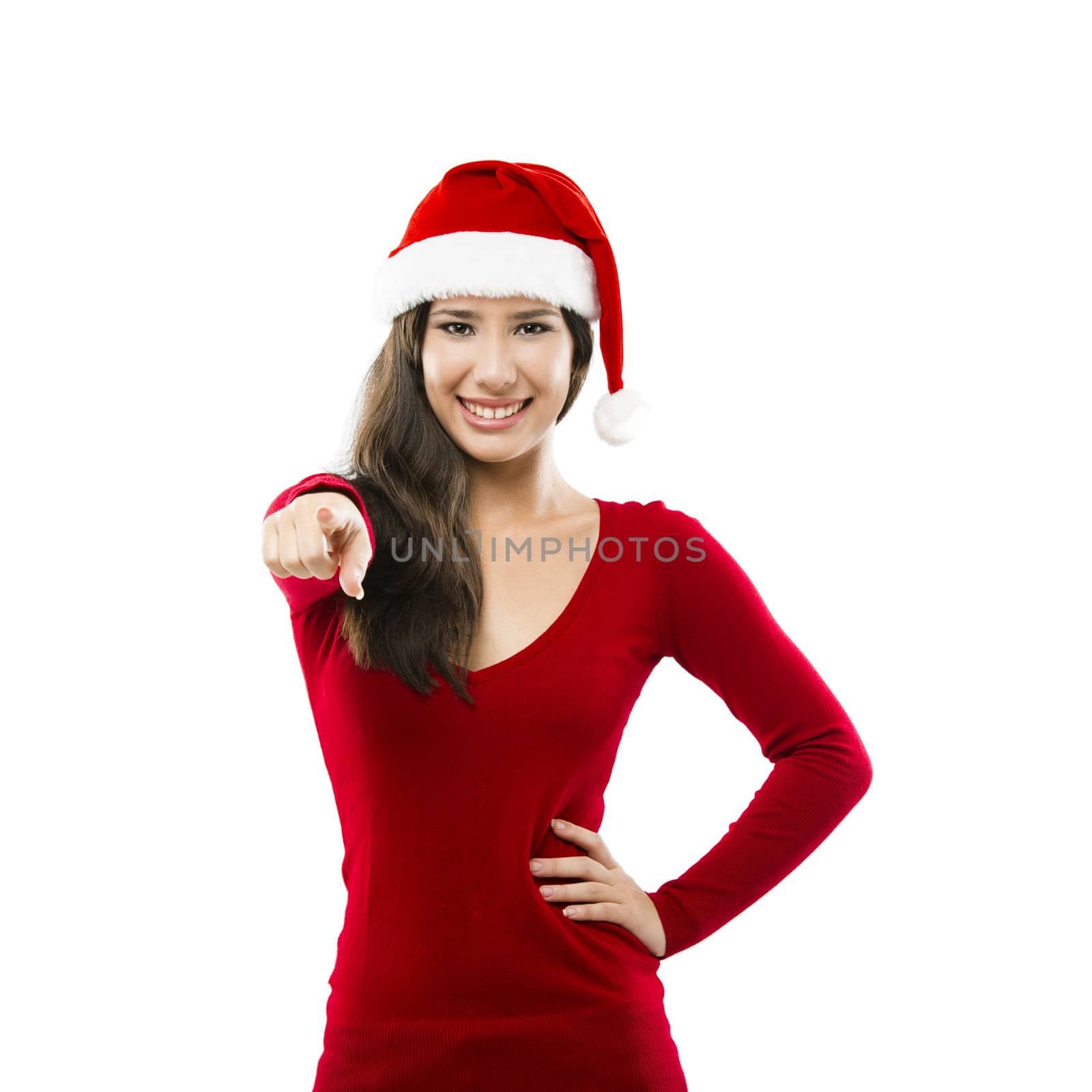 Beautiful asian woman wearing Santa's hat and pointing. isolated on white