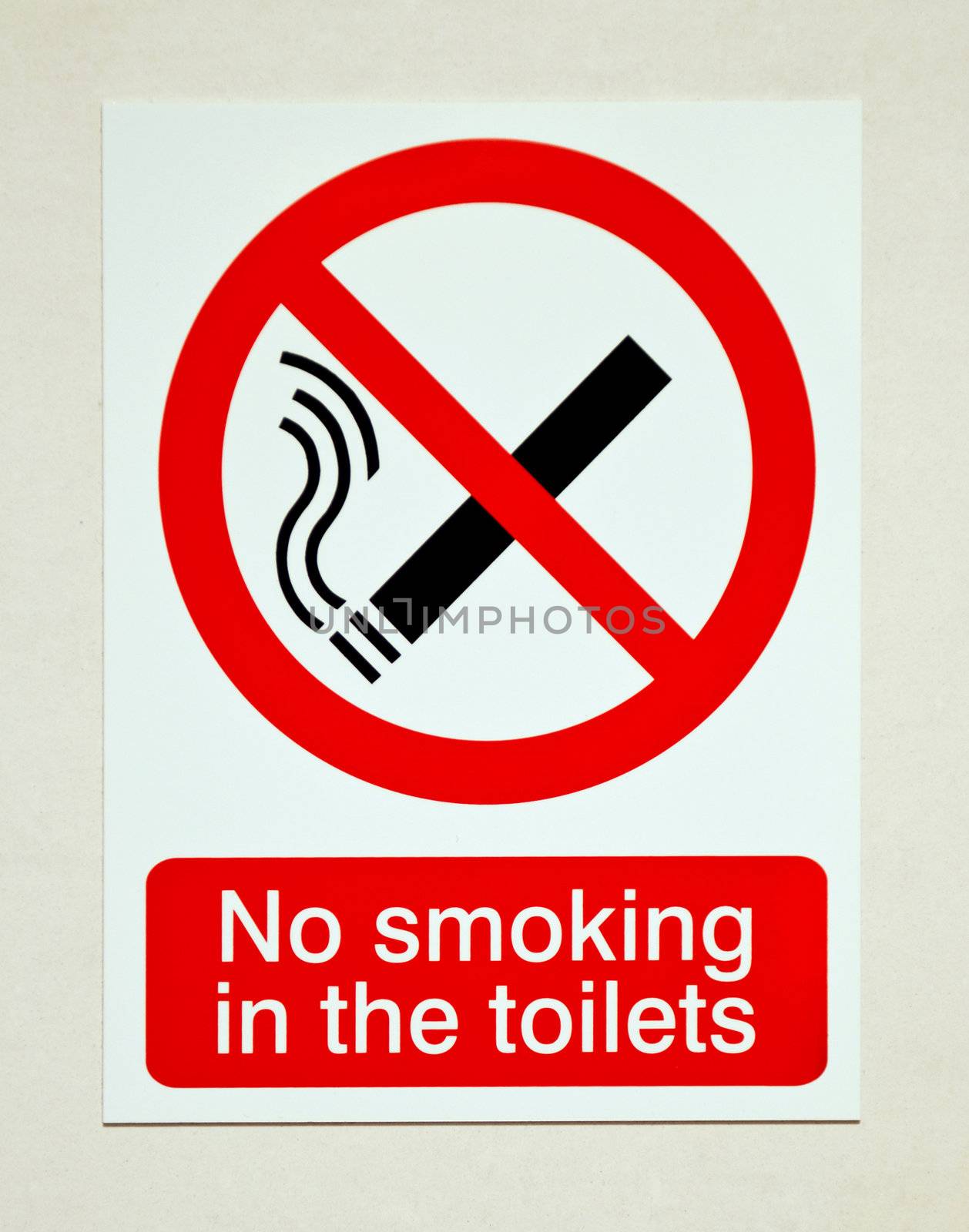 no smoking in the toilets sign on white wall
