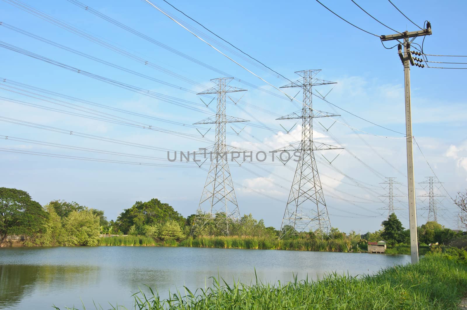 high voltage tower side of the pond., Lumlukga, Patumthani