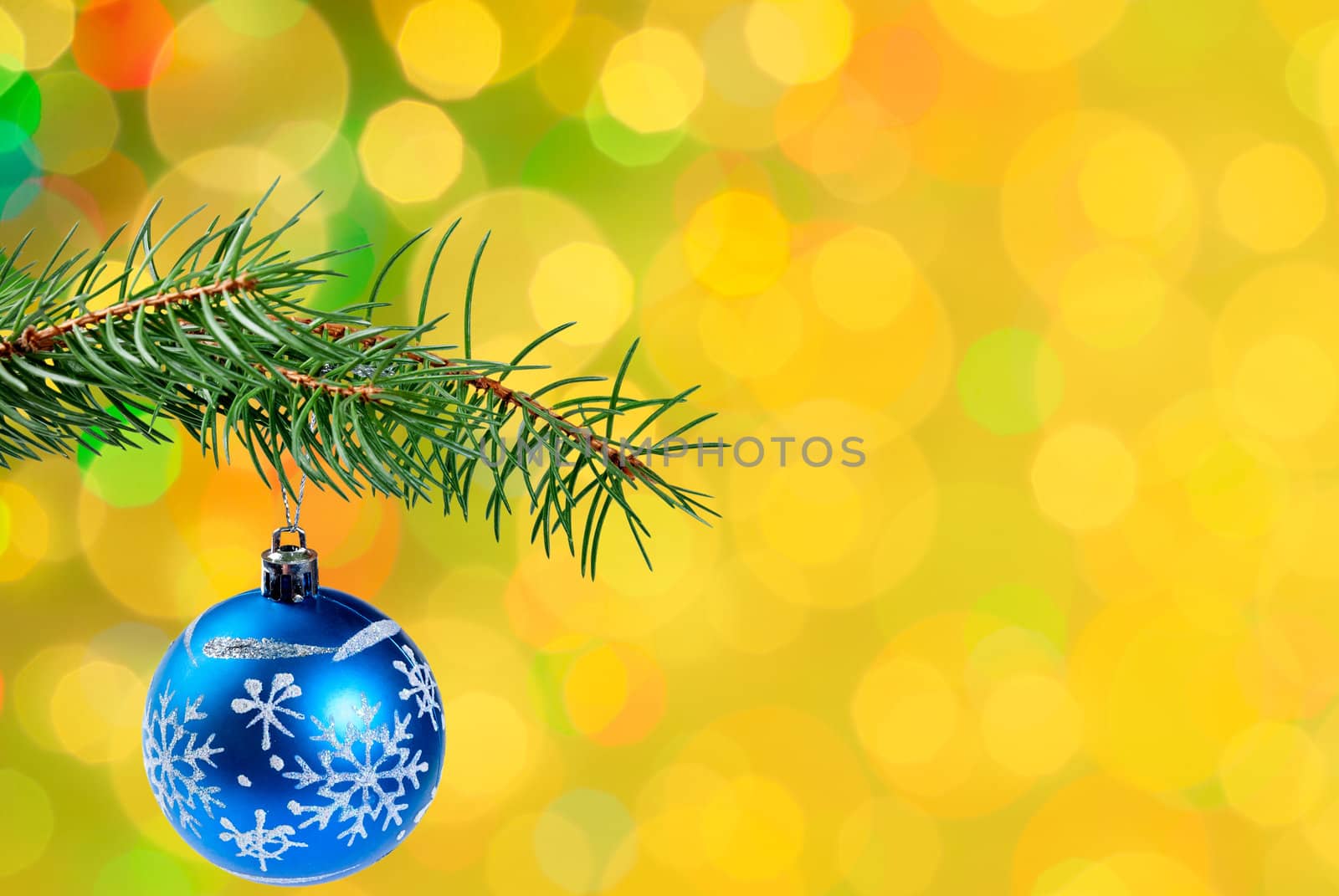Christmas festive background with balls on green branch, place for holiday text