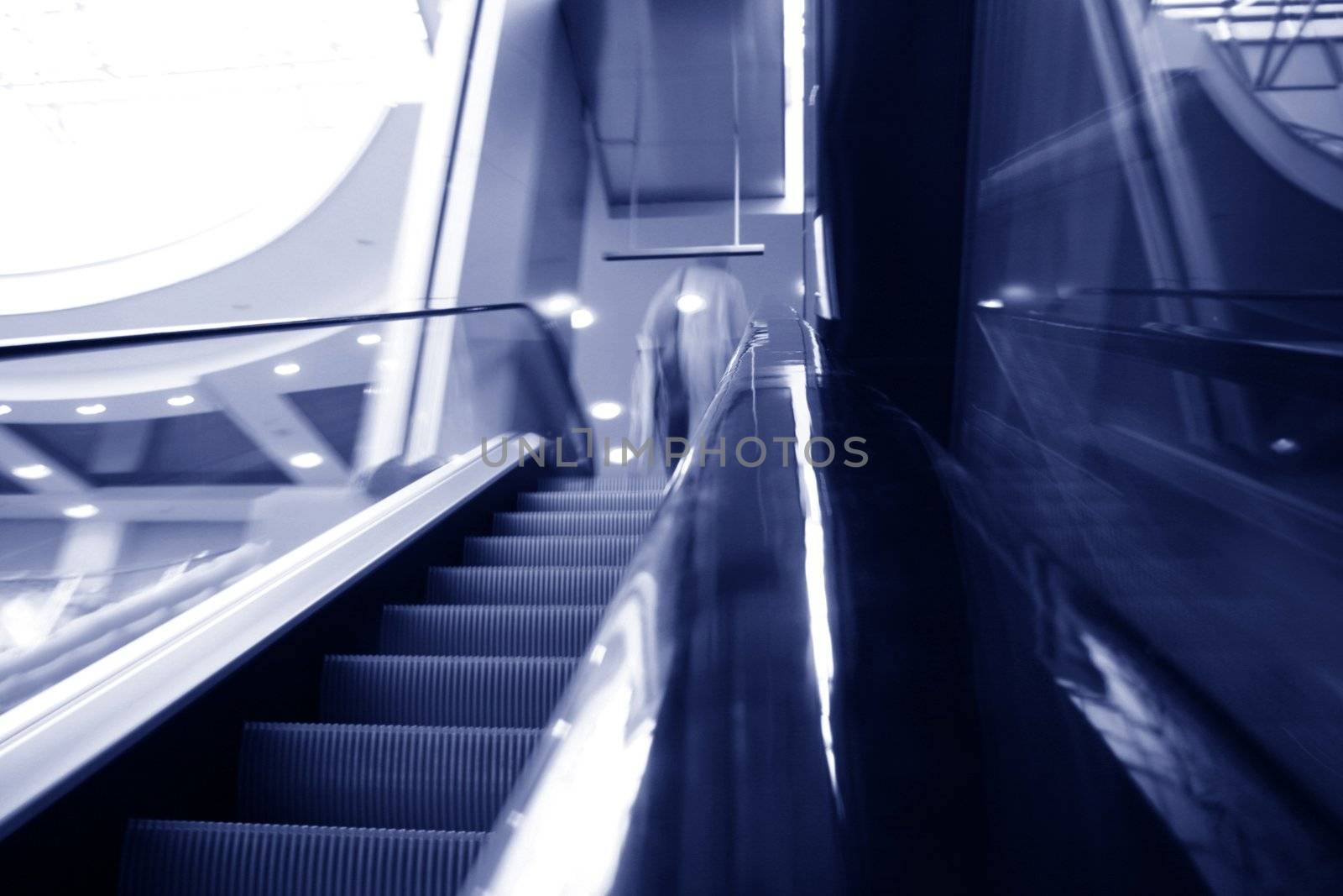 blurred escalator by Yellowj