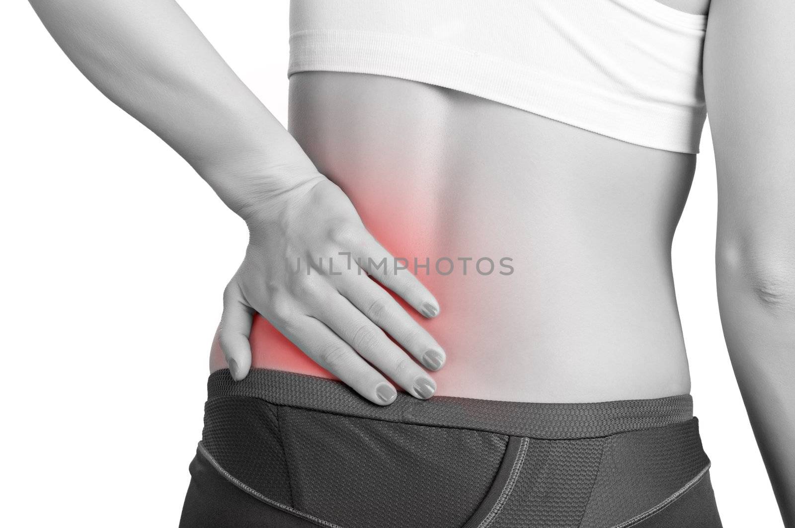 Young woman with pain in her lower back