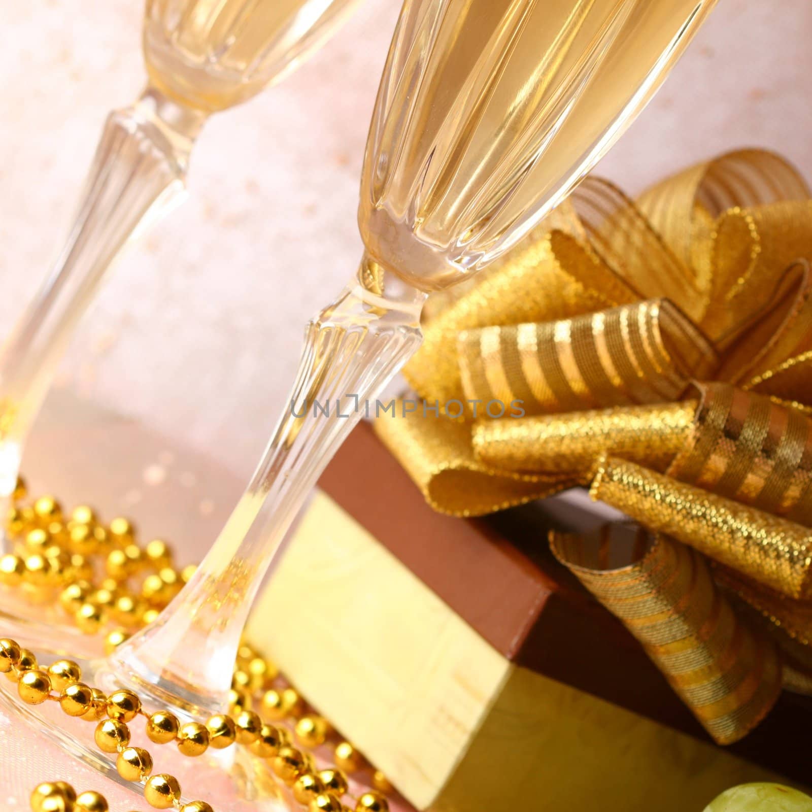 holiday card golden champagne and gift