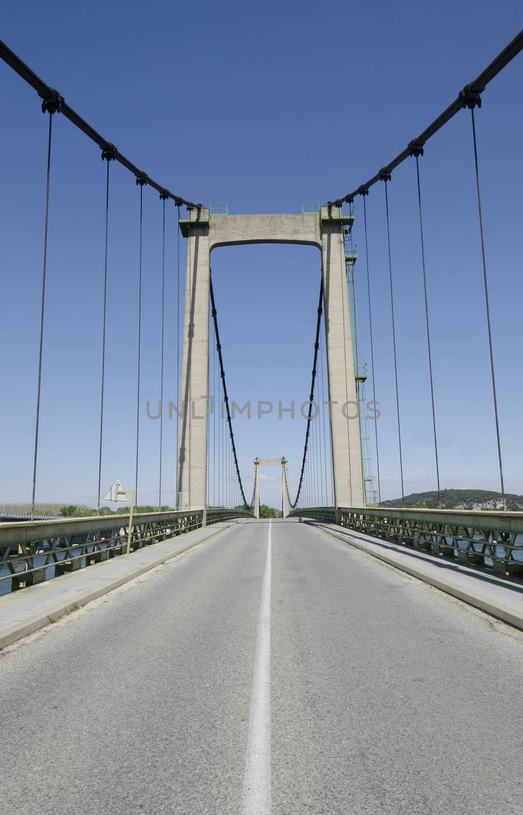 suspended bridge on a blue sky