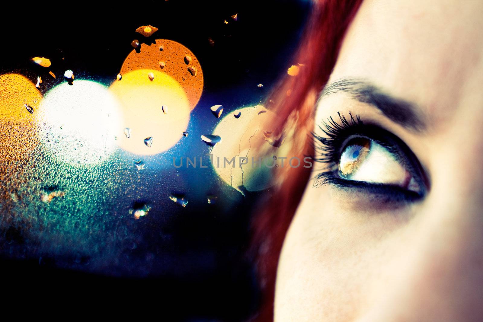 Colorful image detail of girl looking and abstract city lights
