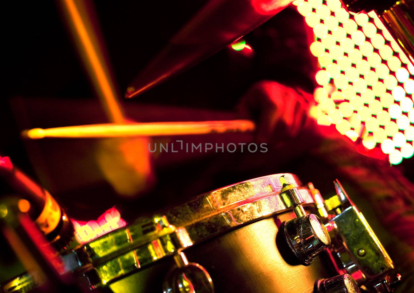 Close up image man playing the drums