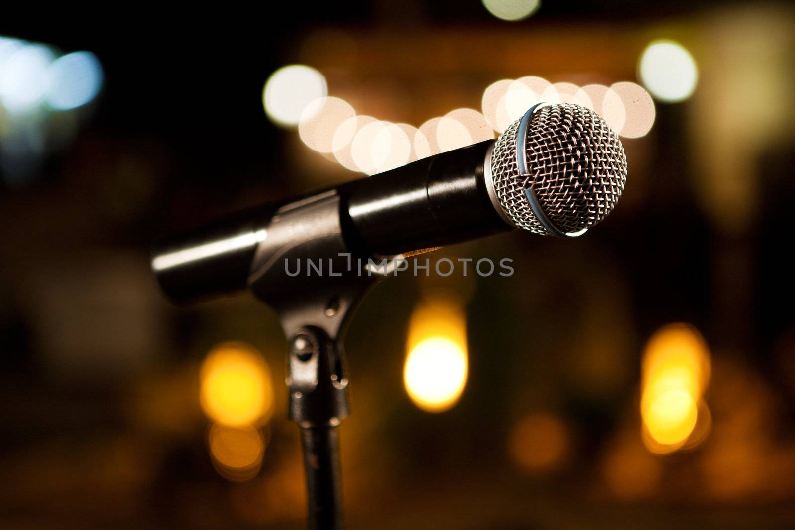 Music background with microphone and Concert lights
