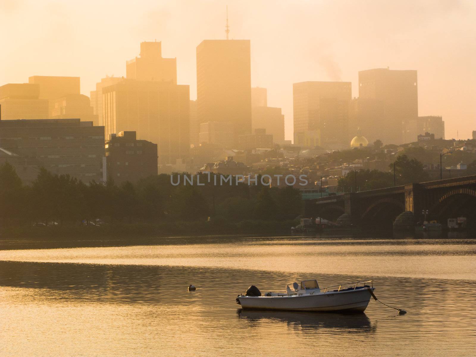 Motorboats anchored in the Charles River in Boston by edan