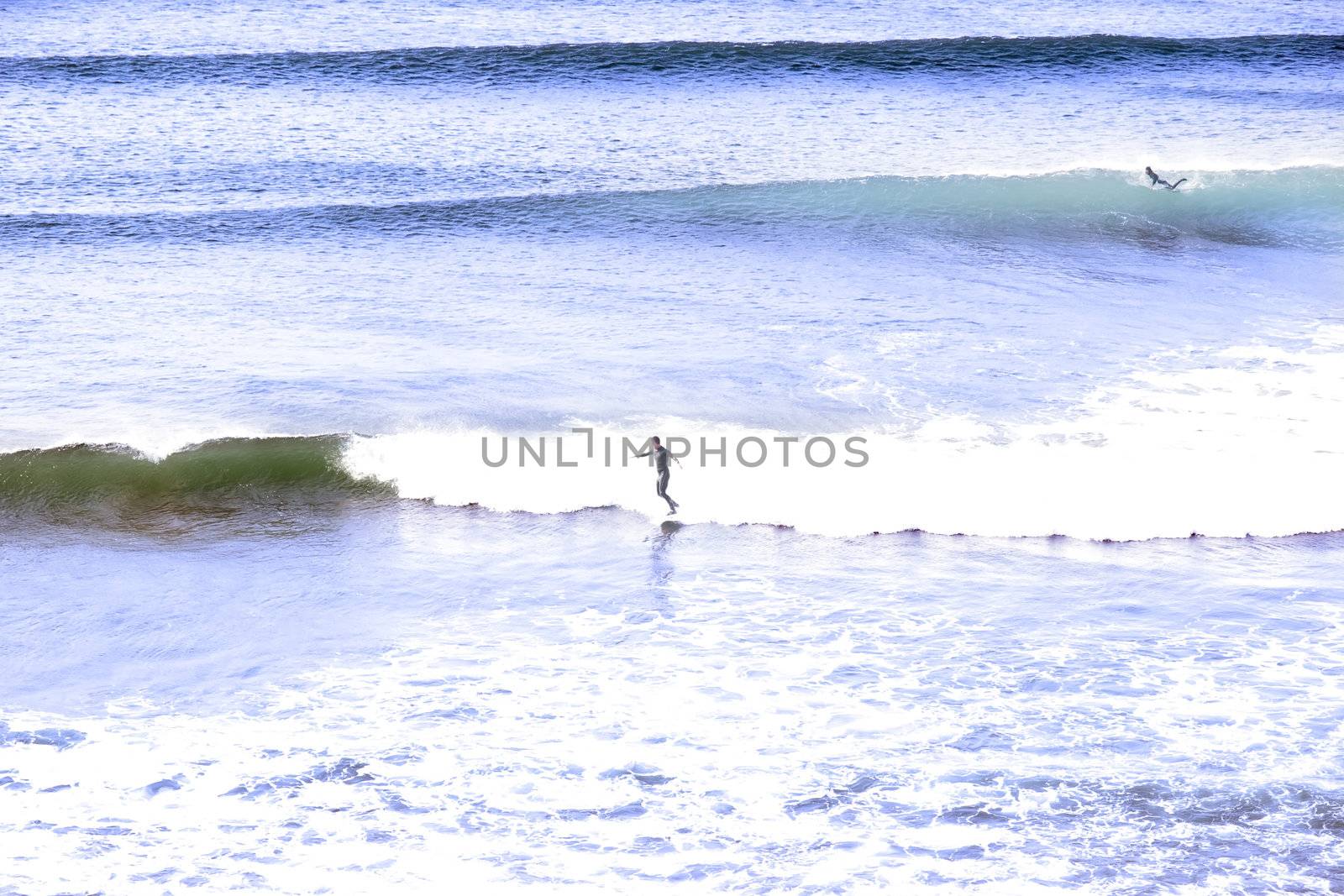 surfing the aqua blue atlantic ocean by morrbyte