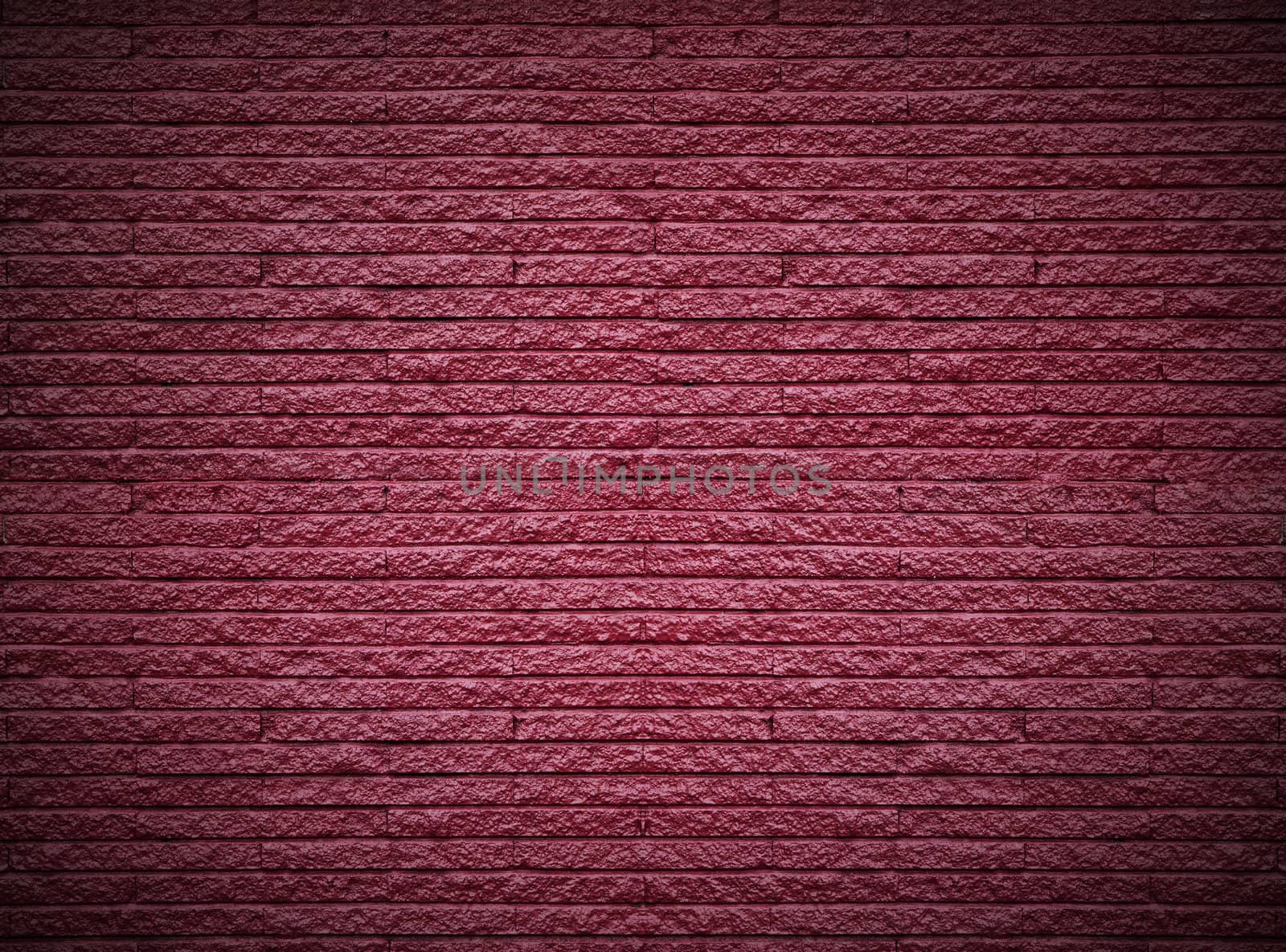 The surface is made of brick red background.
