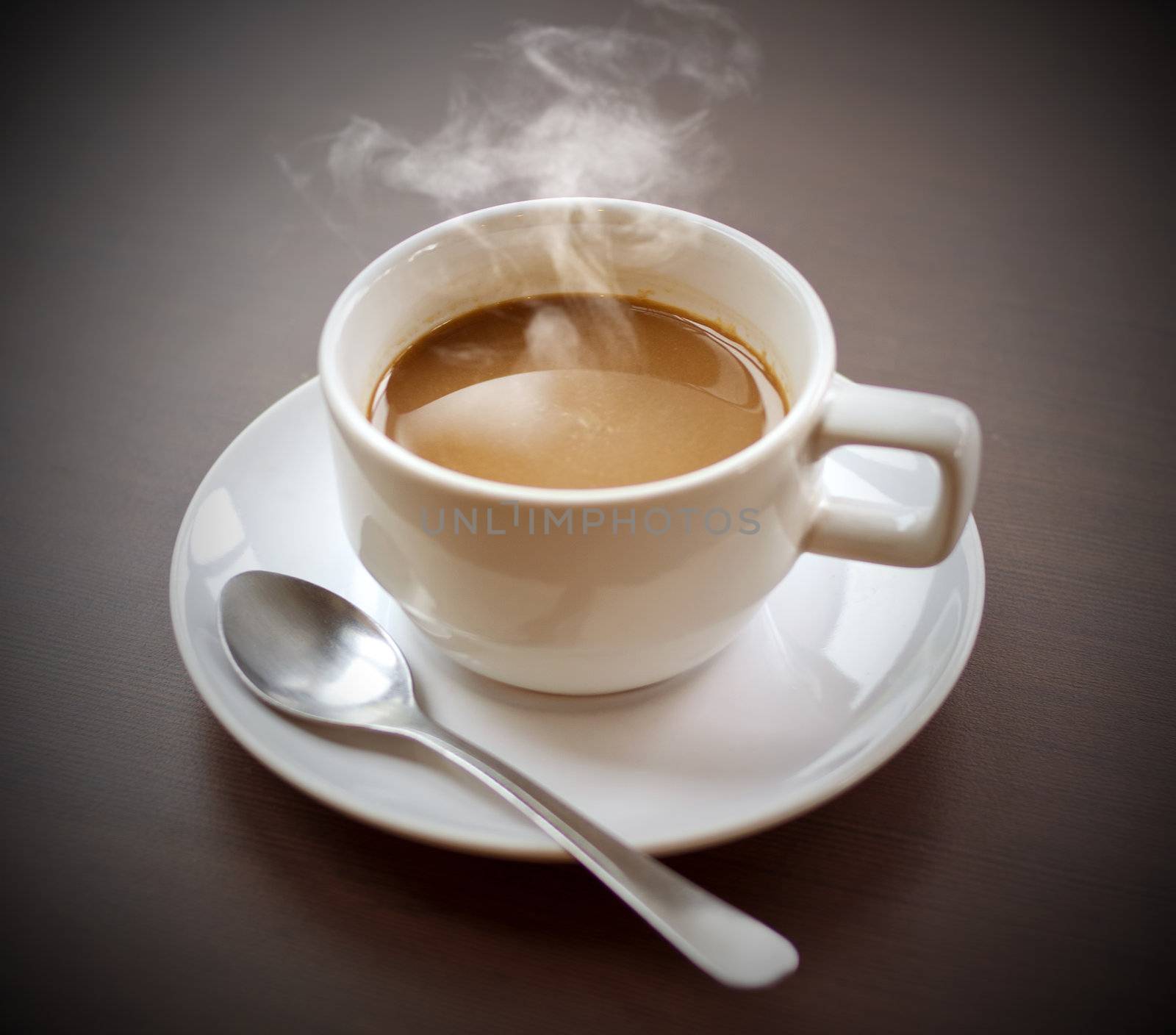 Aroma of hot coffee ready to drink on the desk.