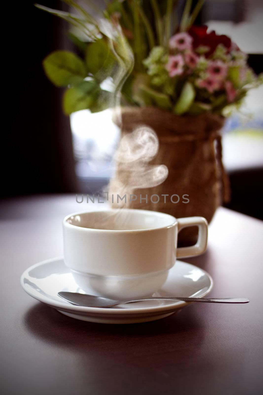 Aroma of hot coffee ready to drink on the desk.