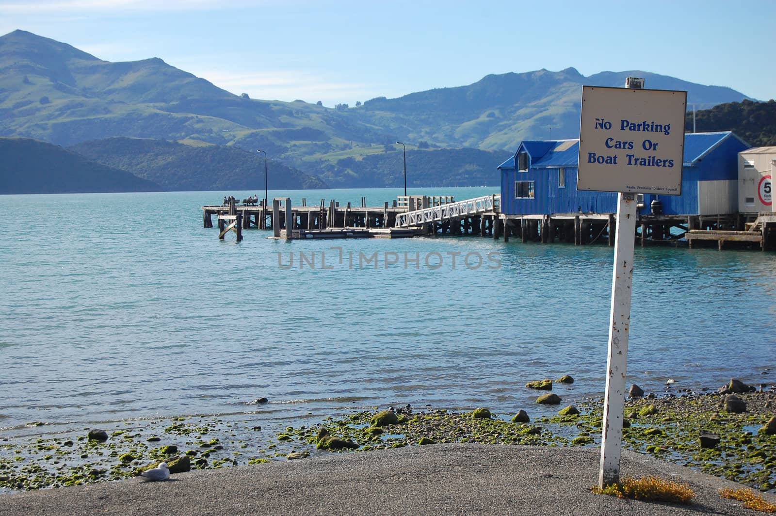 No parking sign sea coast Akaroa bay by danemo