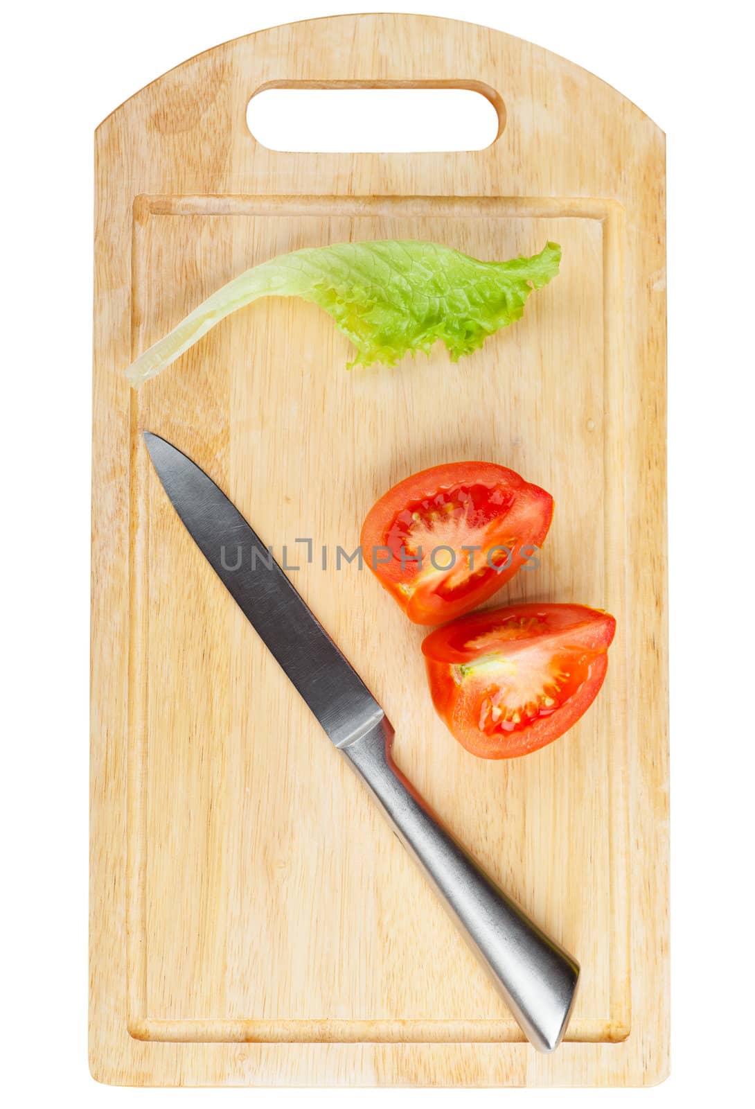 Cutting board with knife and tomato isolated over white background