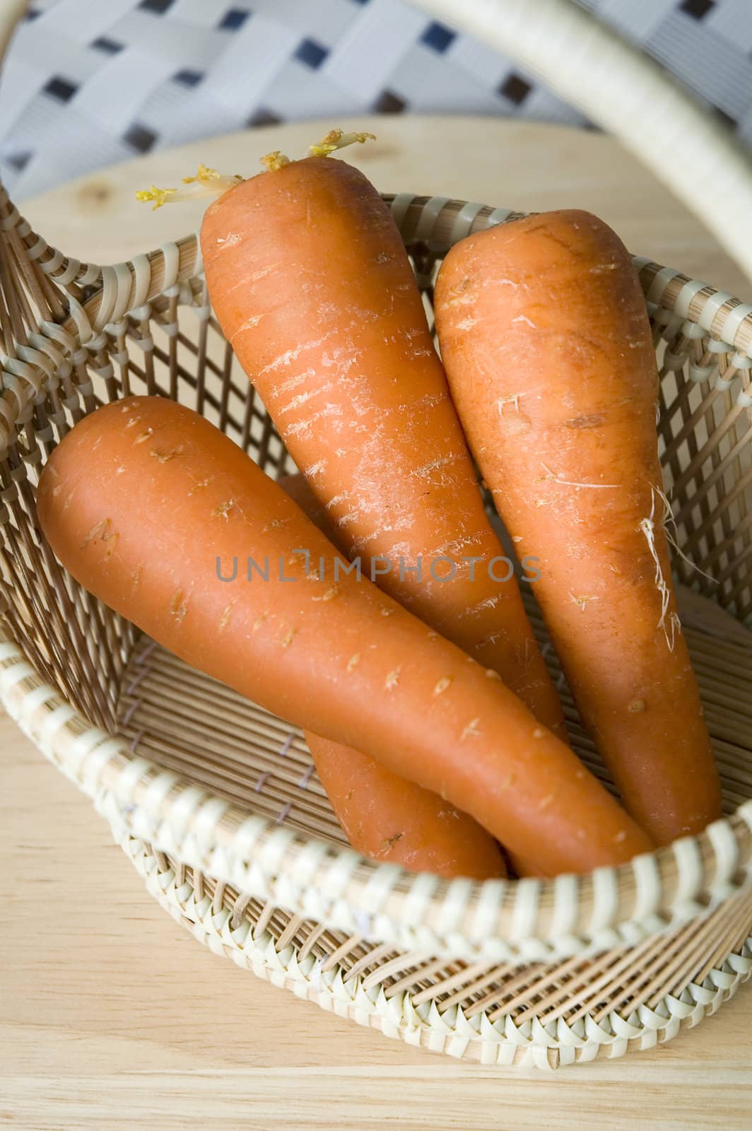 fresh carrot put in basket
