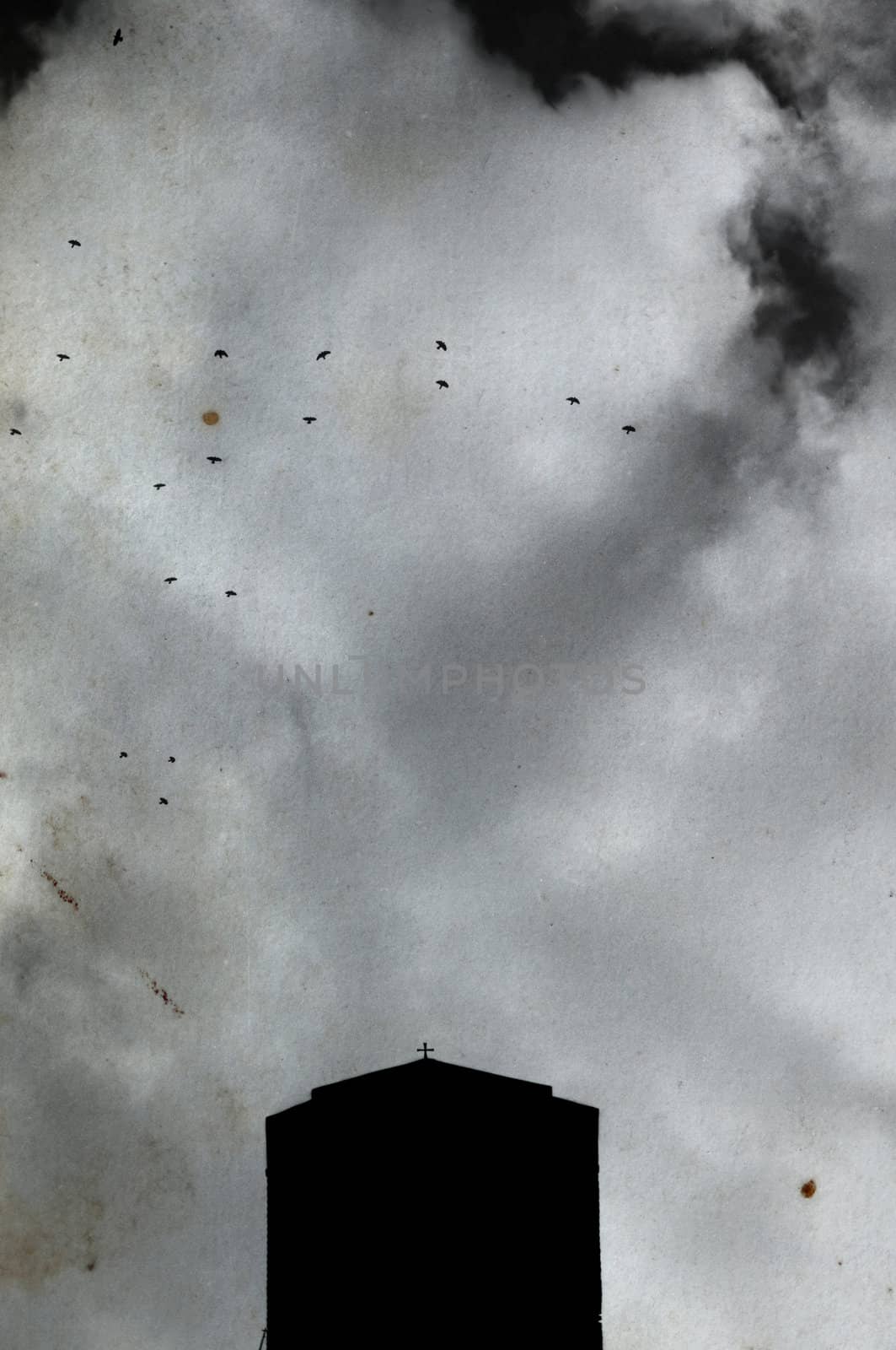 Church cross silhouette, overcast sky and flying birds on stained grungy paper. Orthodox monastery at Meteora, Greece.