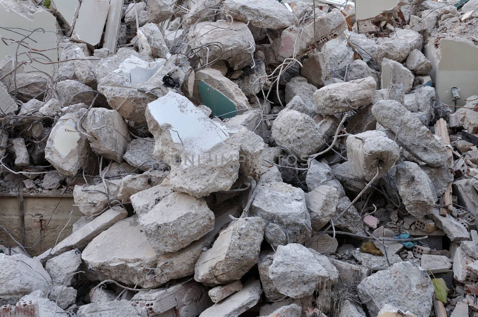 Pile of dusty rubble from a demolished house.