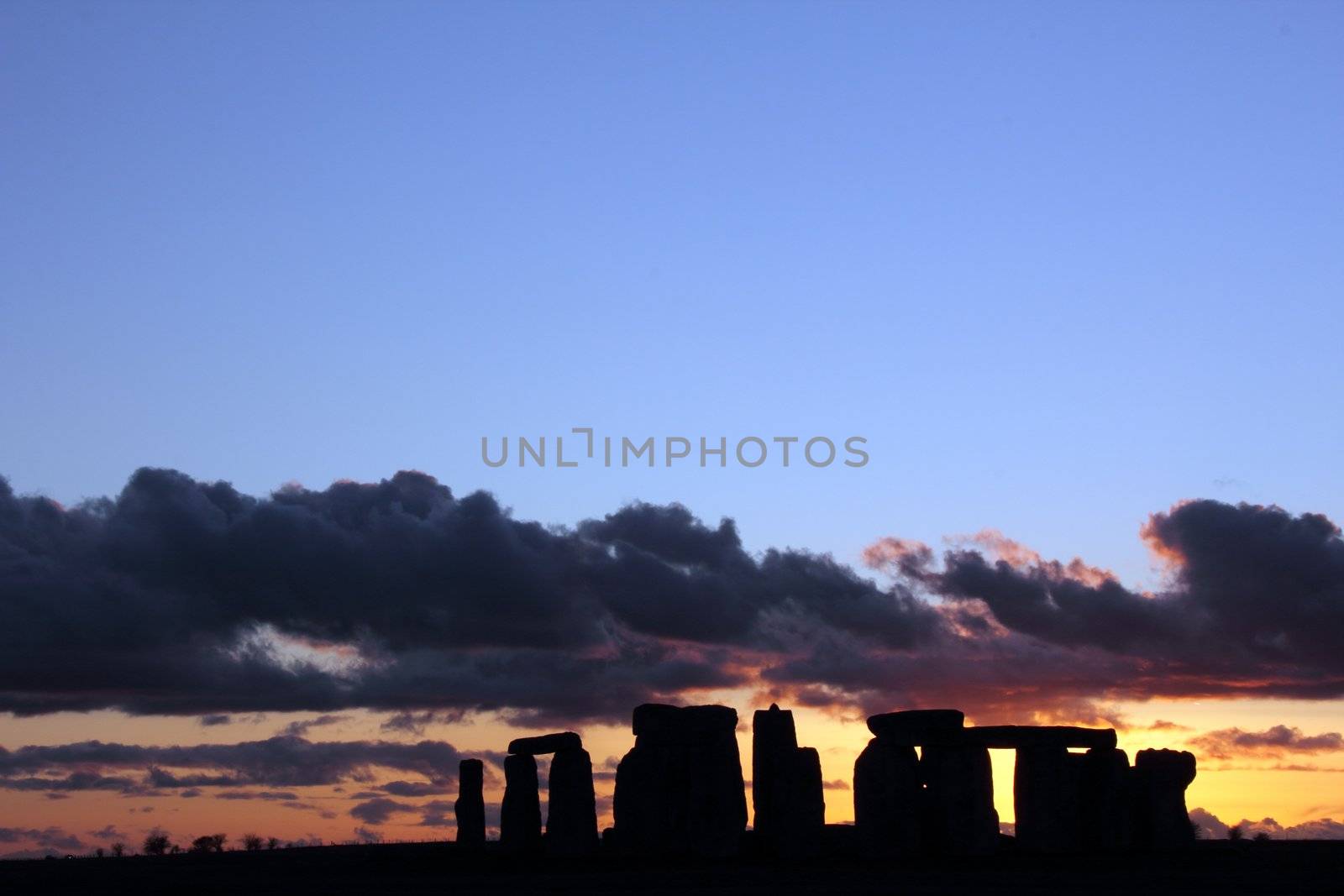 Ancient stoneage monument of stonehenge at sunset in wiltshire