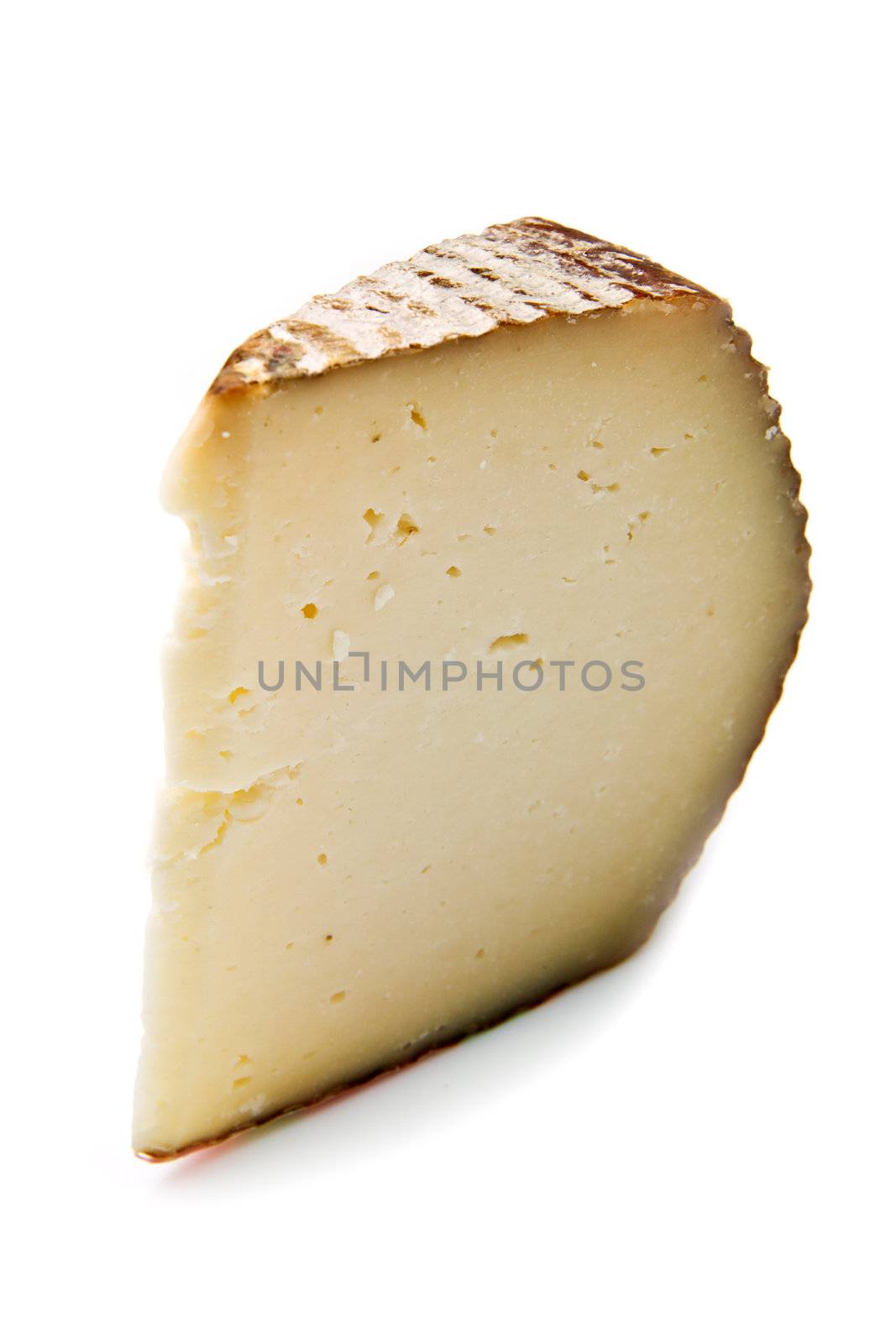 a piece of goat cheese isolated on white 