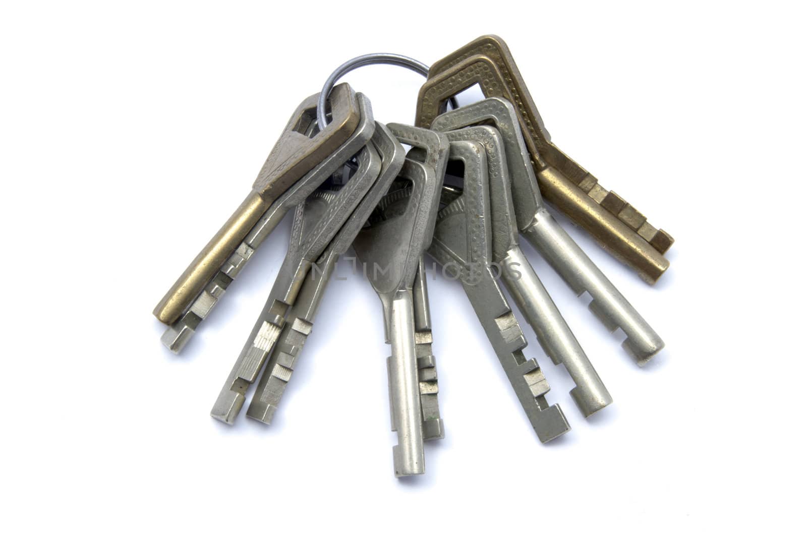 A bunch of old keys isolated on white background 