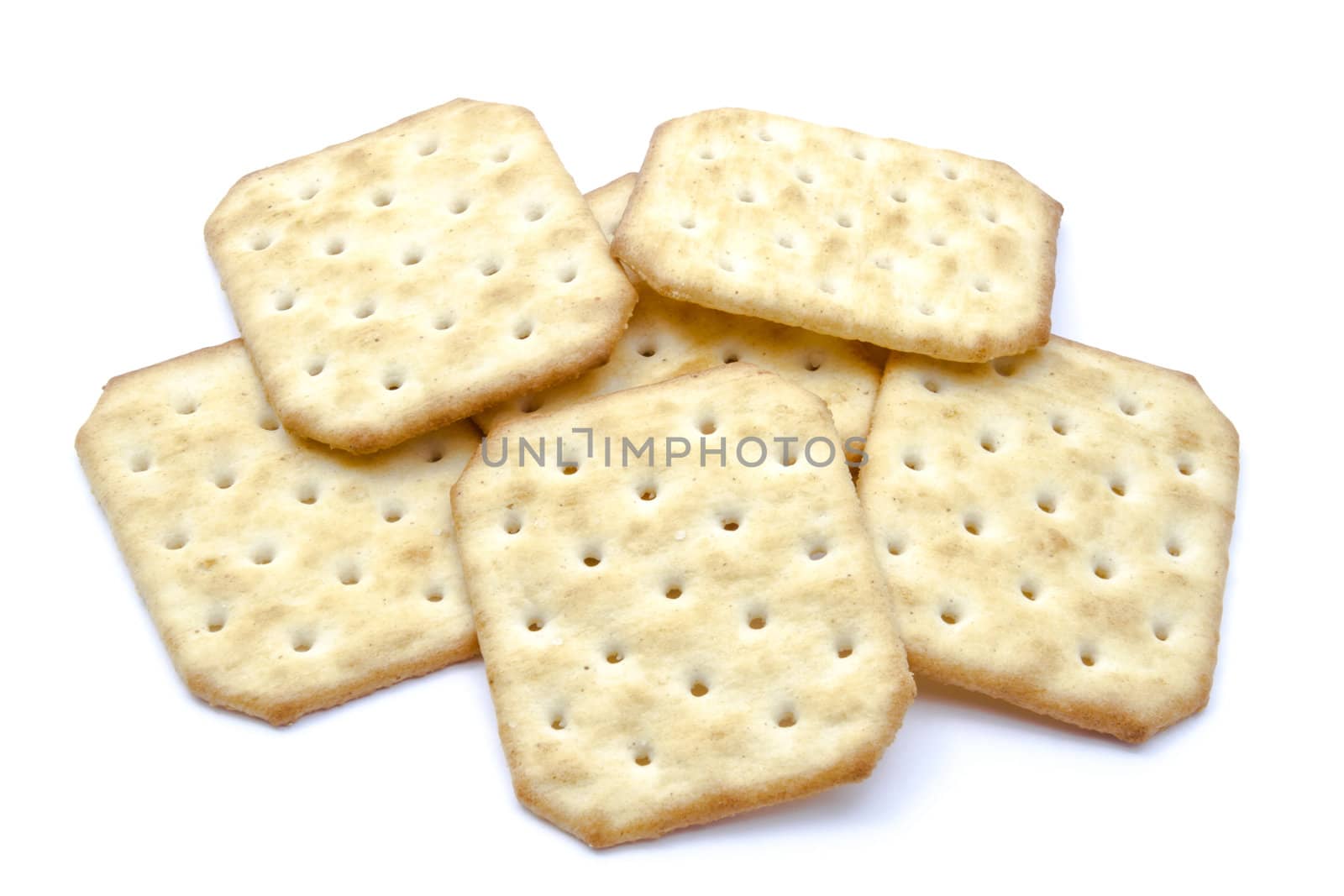 salty crackers closeup on white background