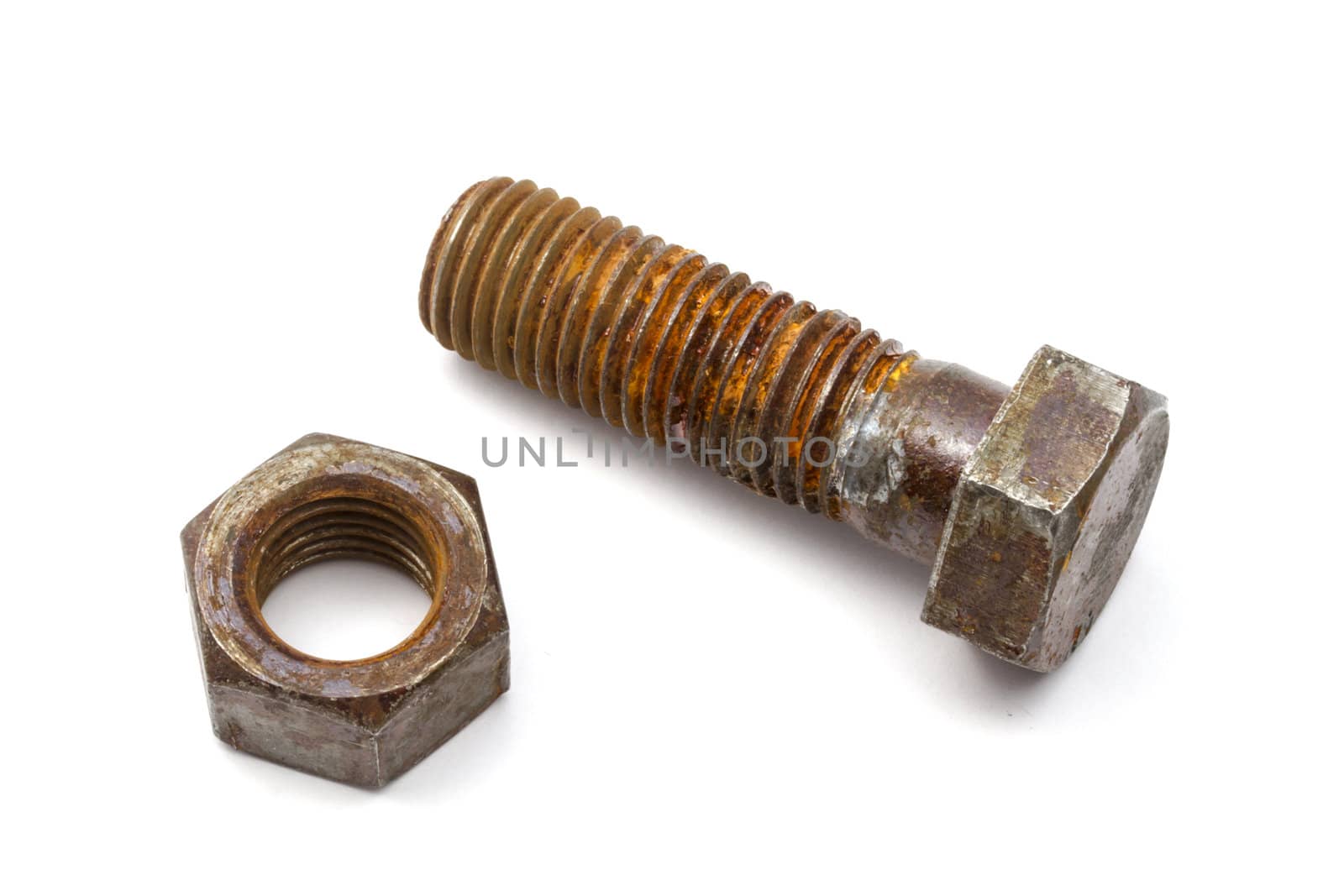 Rusty nut and bolt isolated on white background 