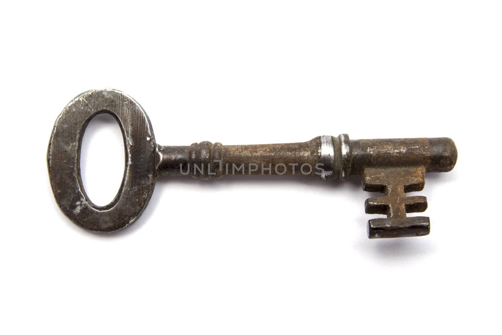 Big old key closeup on white background 