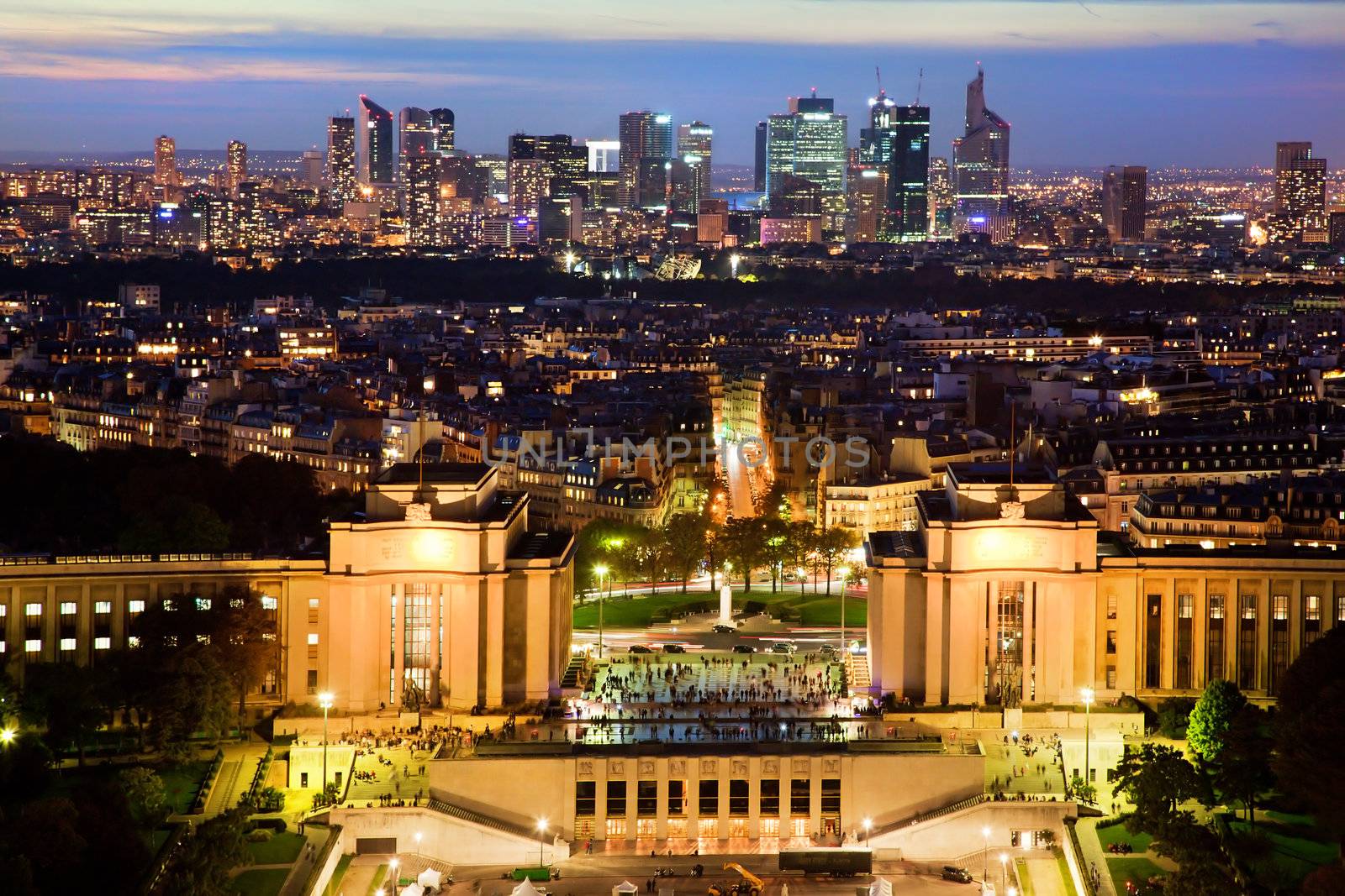 Paris panorama, France at night. View on La Defense from Eiffel Tower.