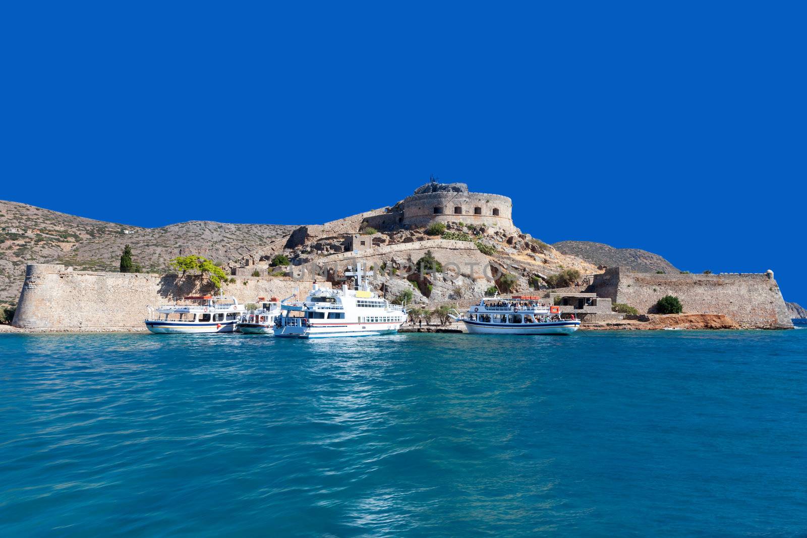 Spinalonga is a small island about Crete, located in the region of Lasithi in the Gulf of Mirabello, to the North of the villages of Plaka, Elounda