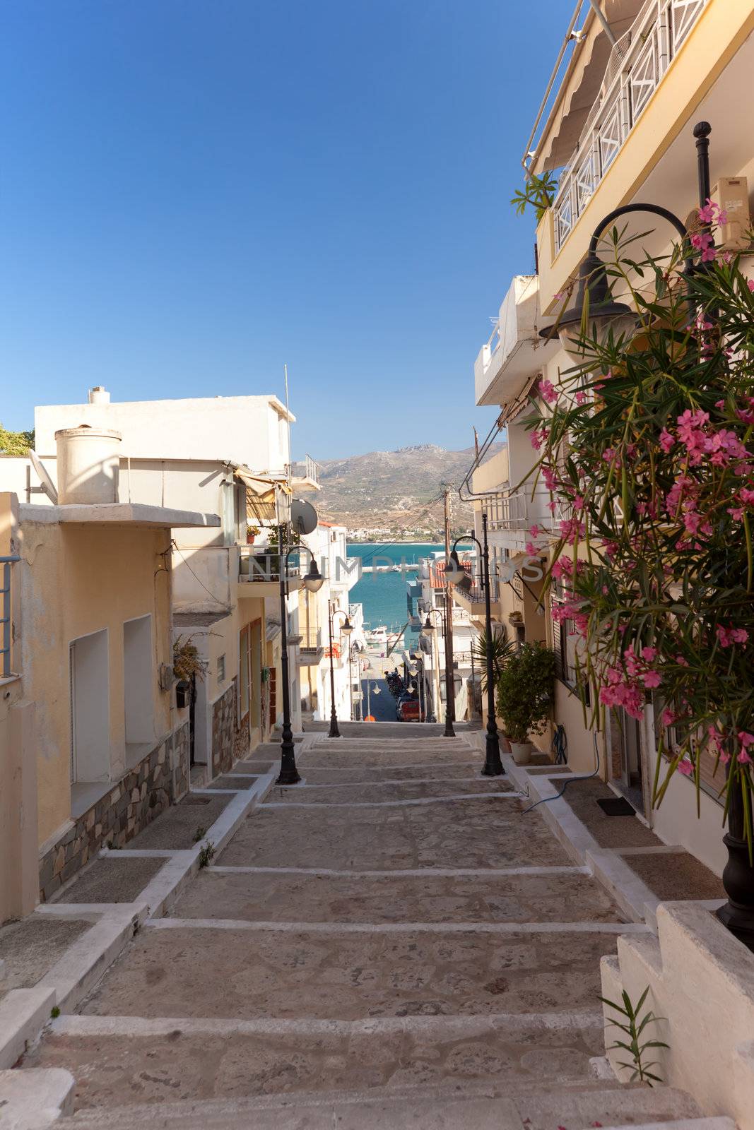 A walking path with steps in the town of Sitia by DimasEKB