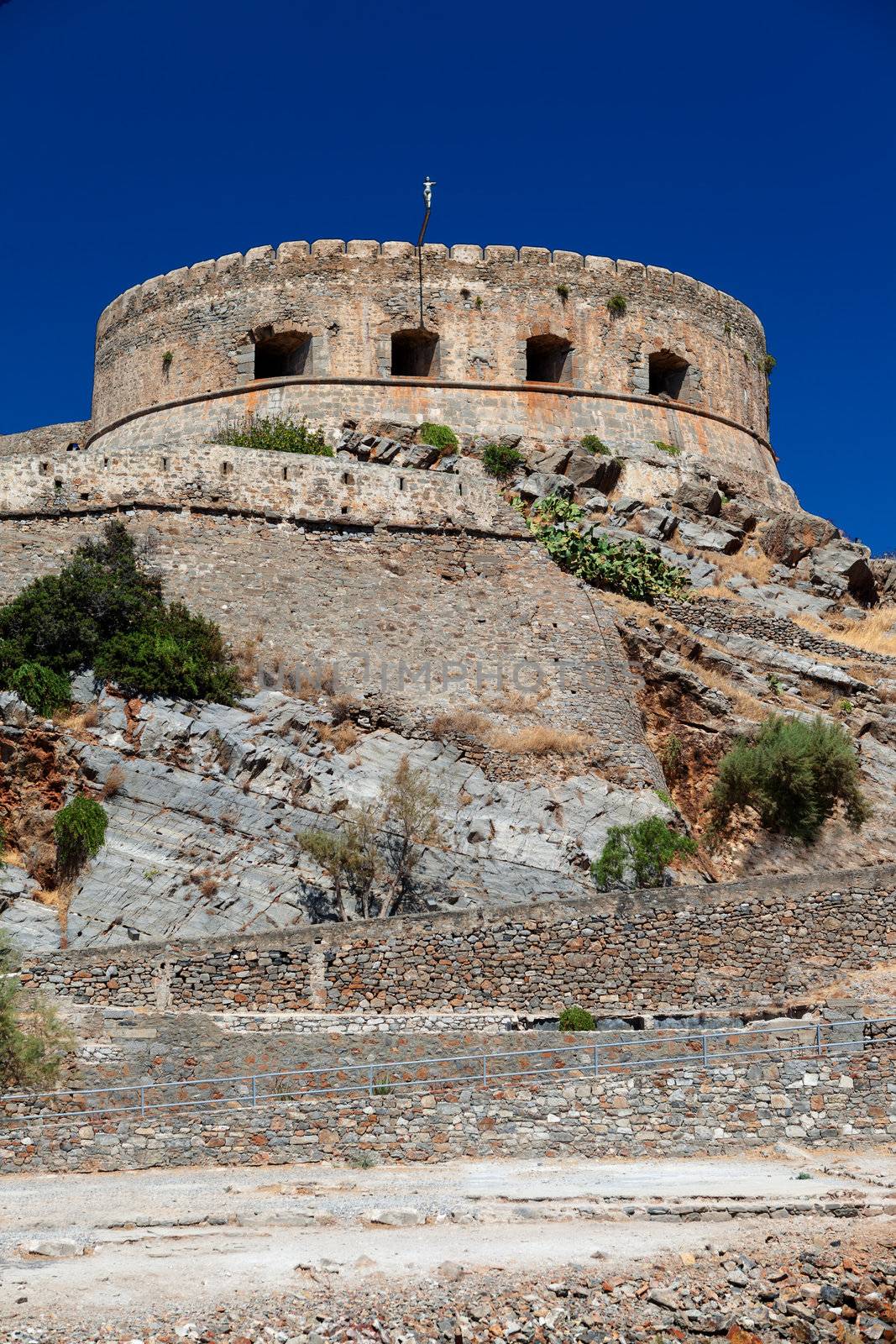 Spinalonga is a small island about Crete, located in the region of Lasithi in the Gulf of Mirabello, to the North of the villages of Plaka, Elounda