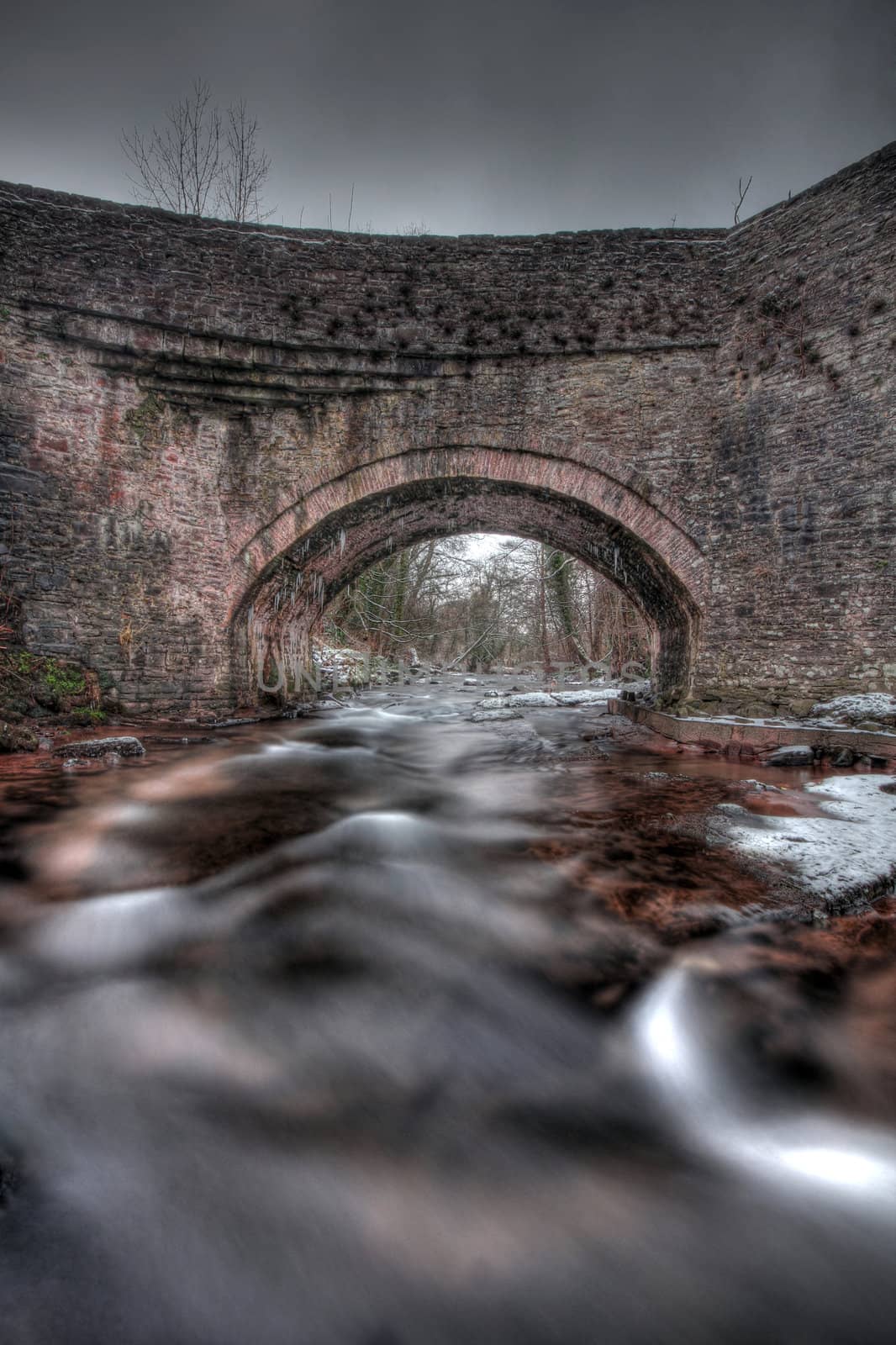 Old brick bridge in Wales at Christmas  