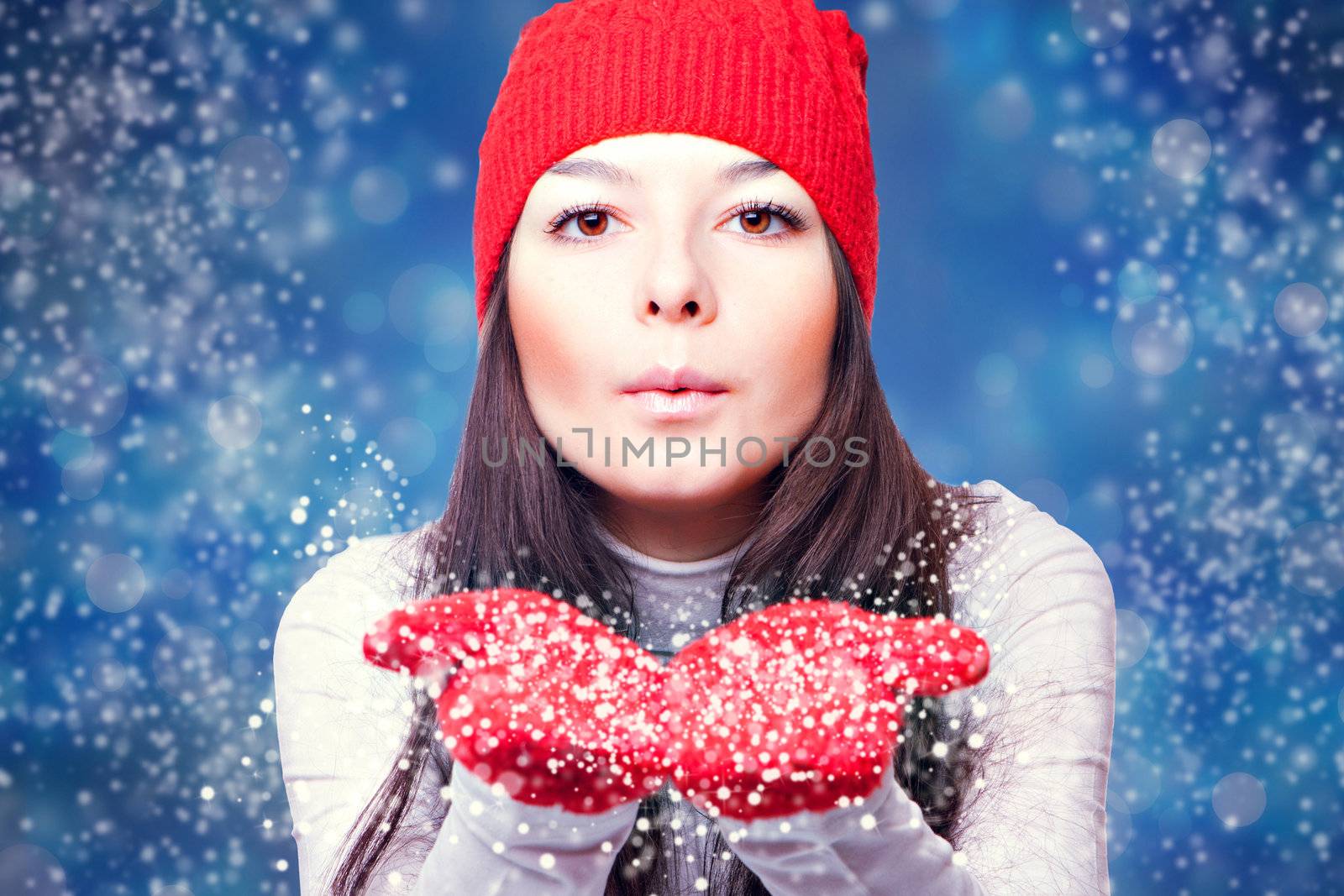 Christmas woman blowing snow by nigerfoxy