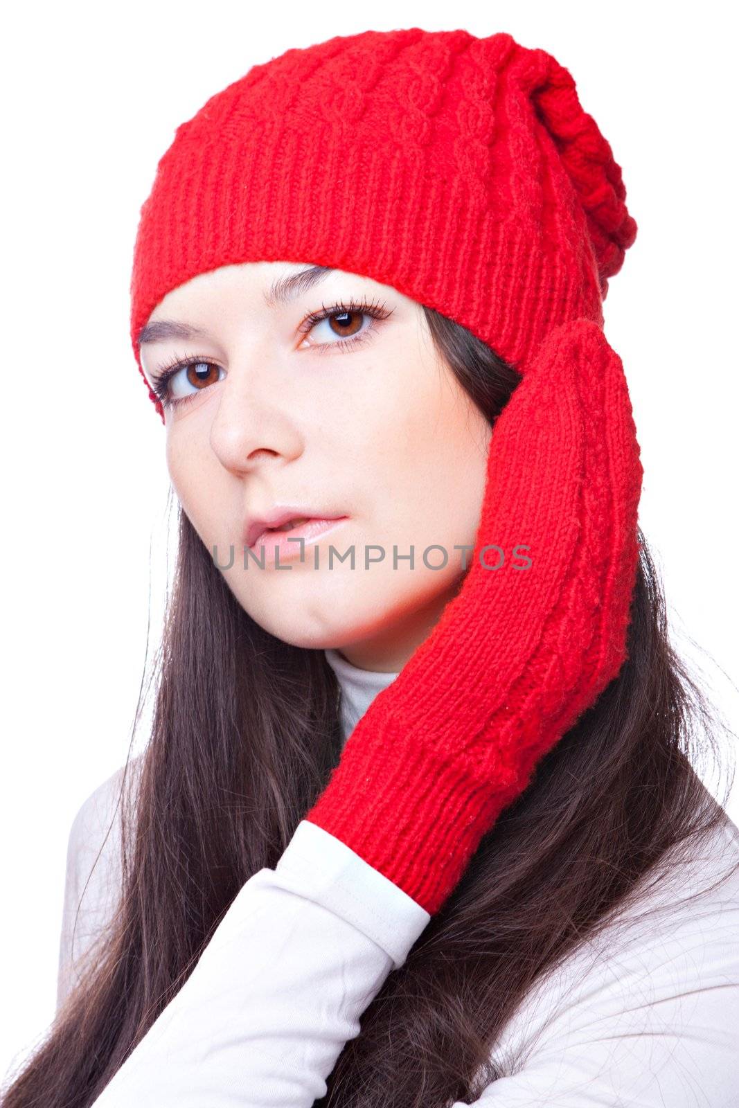 beauty woman in a red cap and mittens isolated