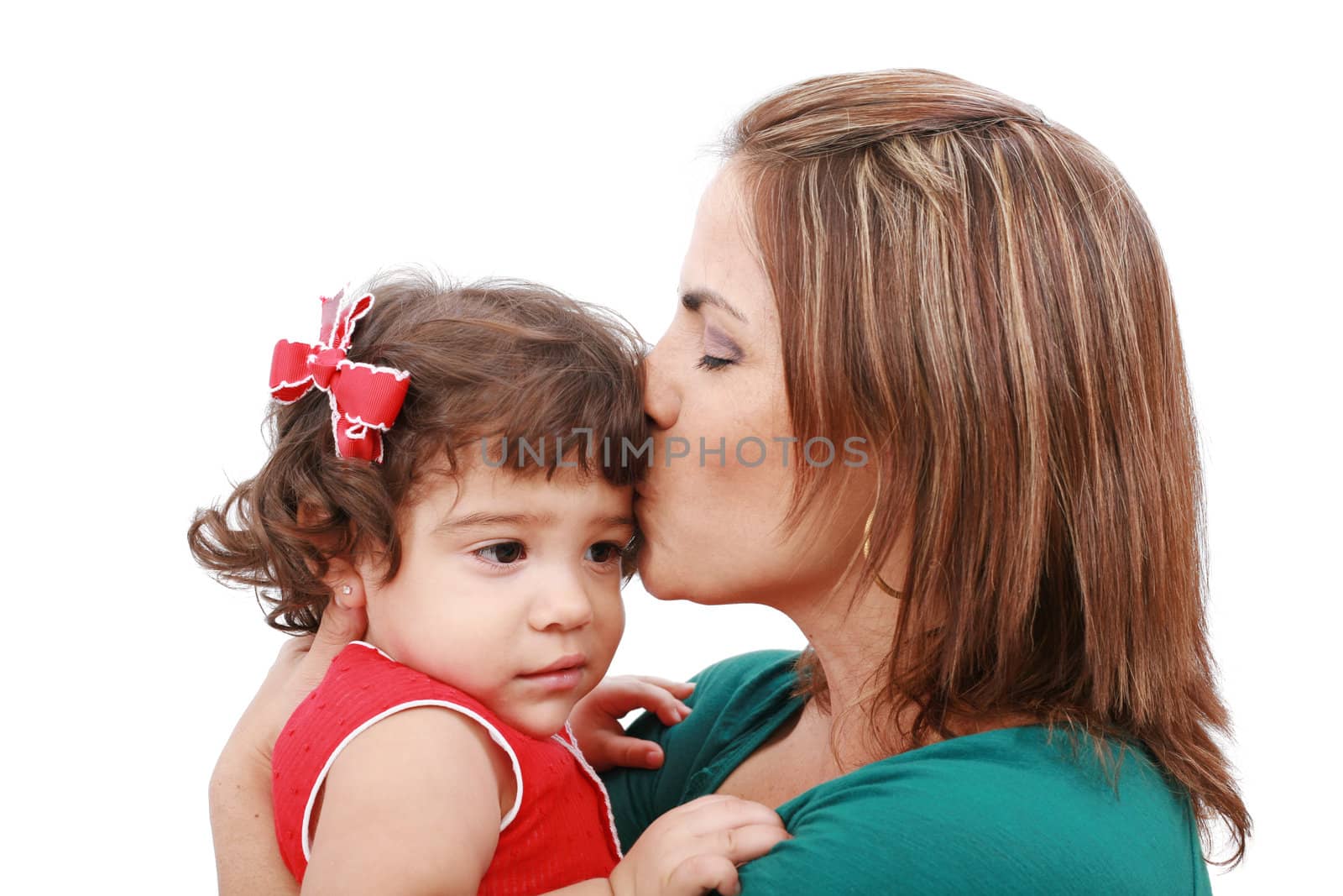 Happy mother kissing her daughter, isolated on white background by dacasdo