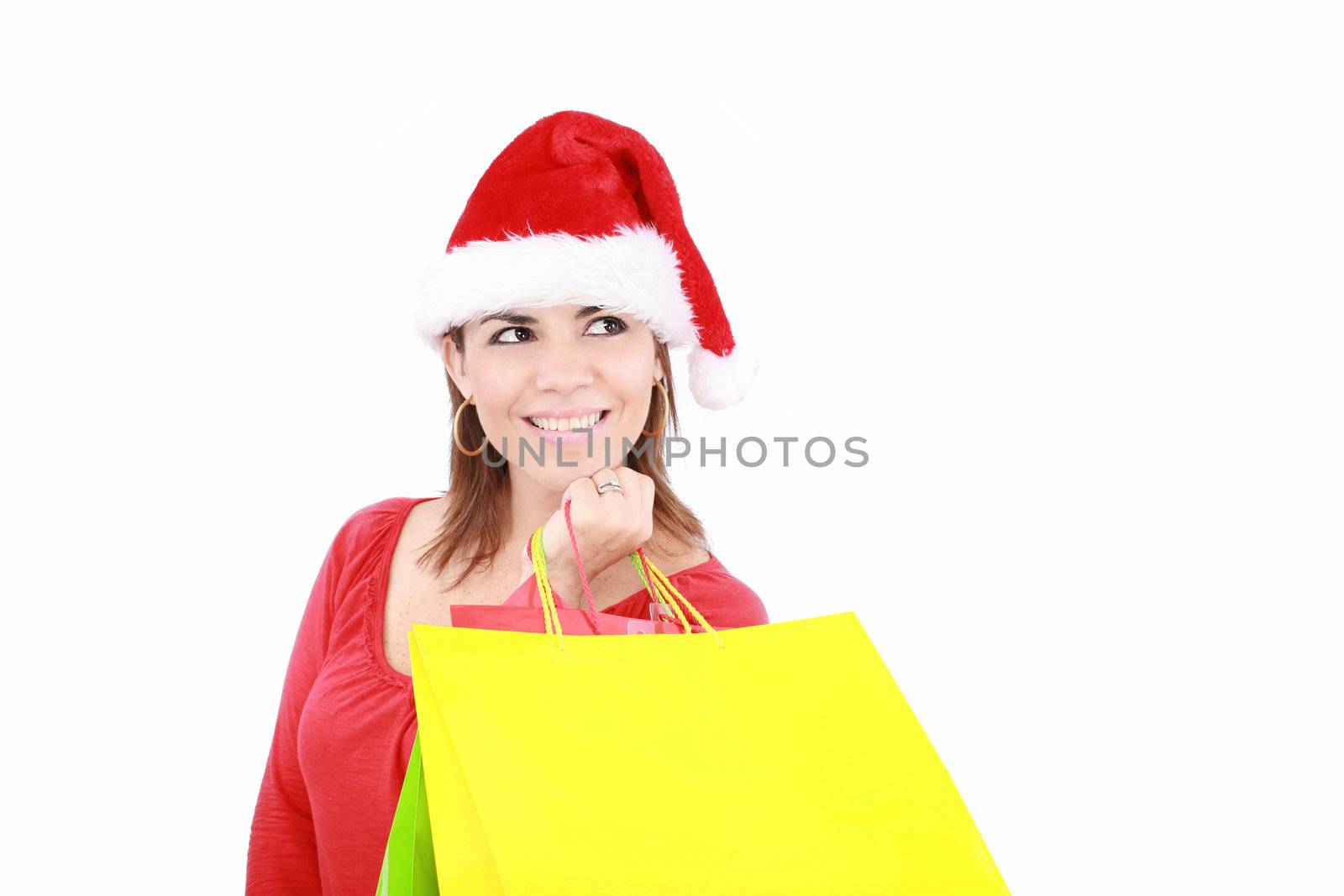 Shopping Christmas woman smiling. Isolated over white background by dacasdo