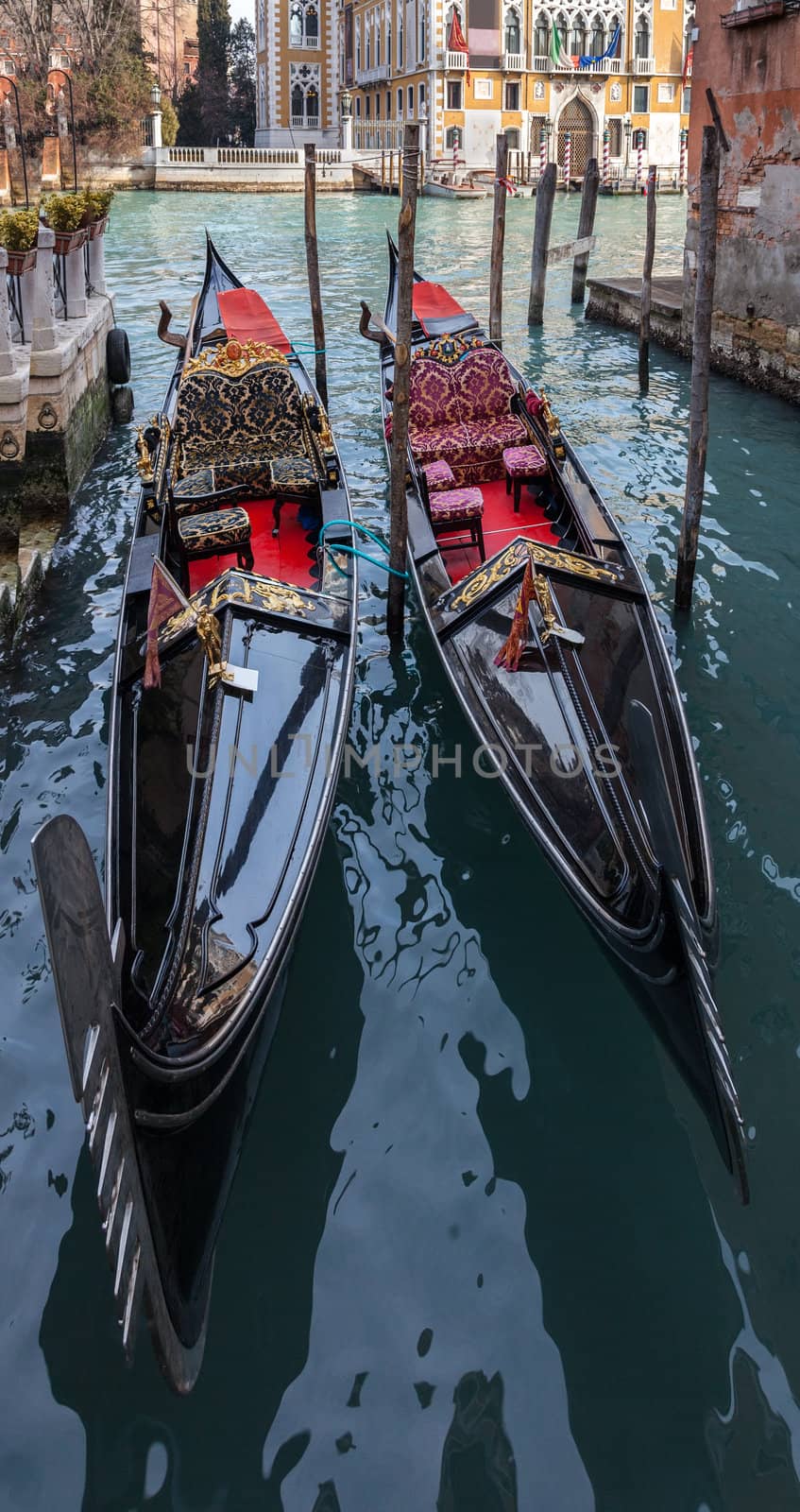Two gondola on a small canal in Venice Italy.