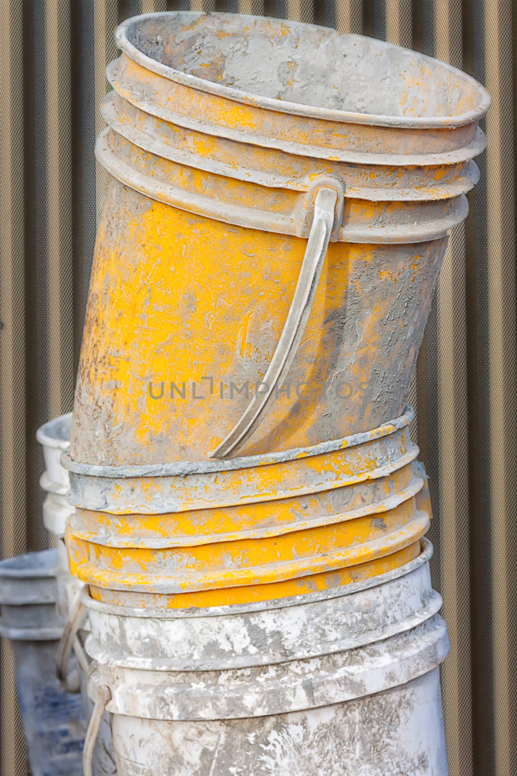 Cement Worker Bucket on the Construction Site