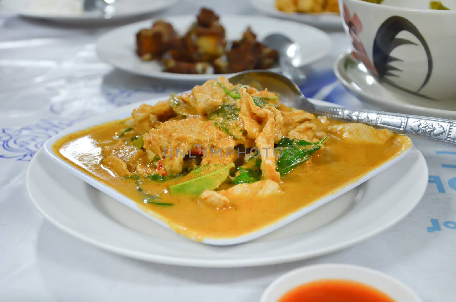 pork in ground peanut-coconut cream curry , Thai food
