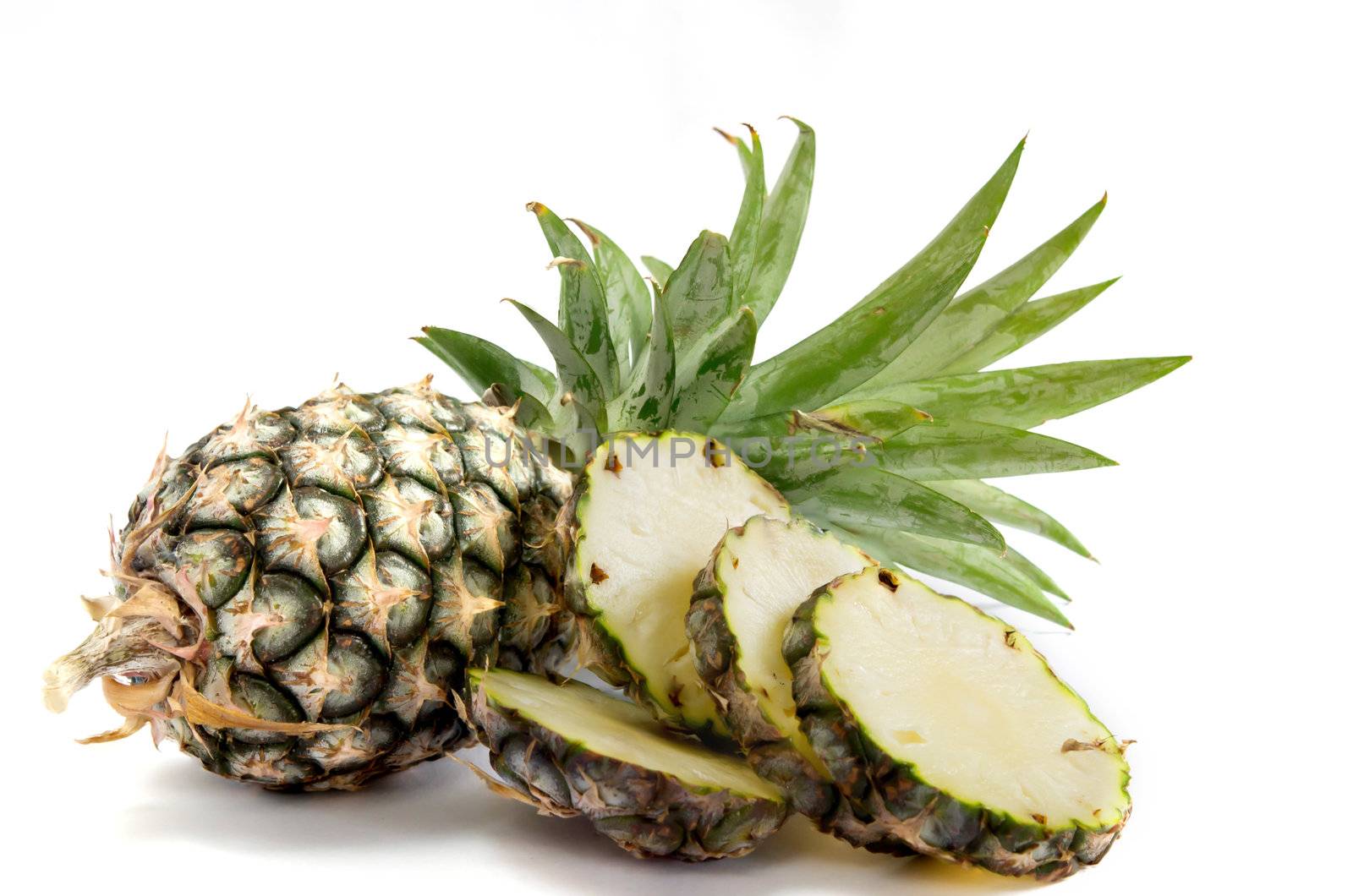 fresh  pineapple and sliced   on white background
