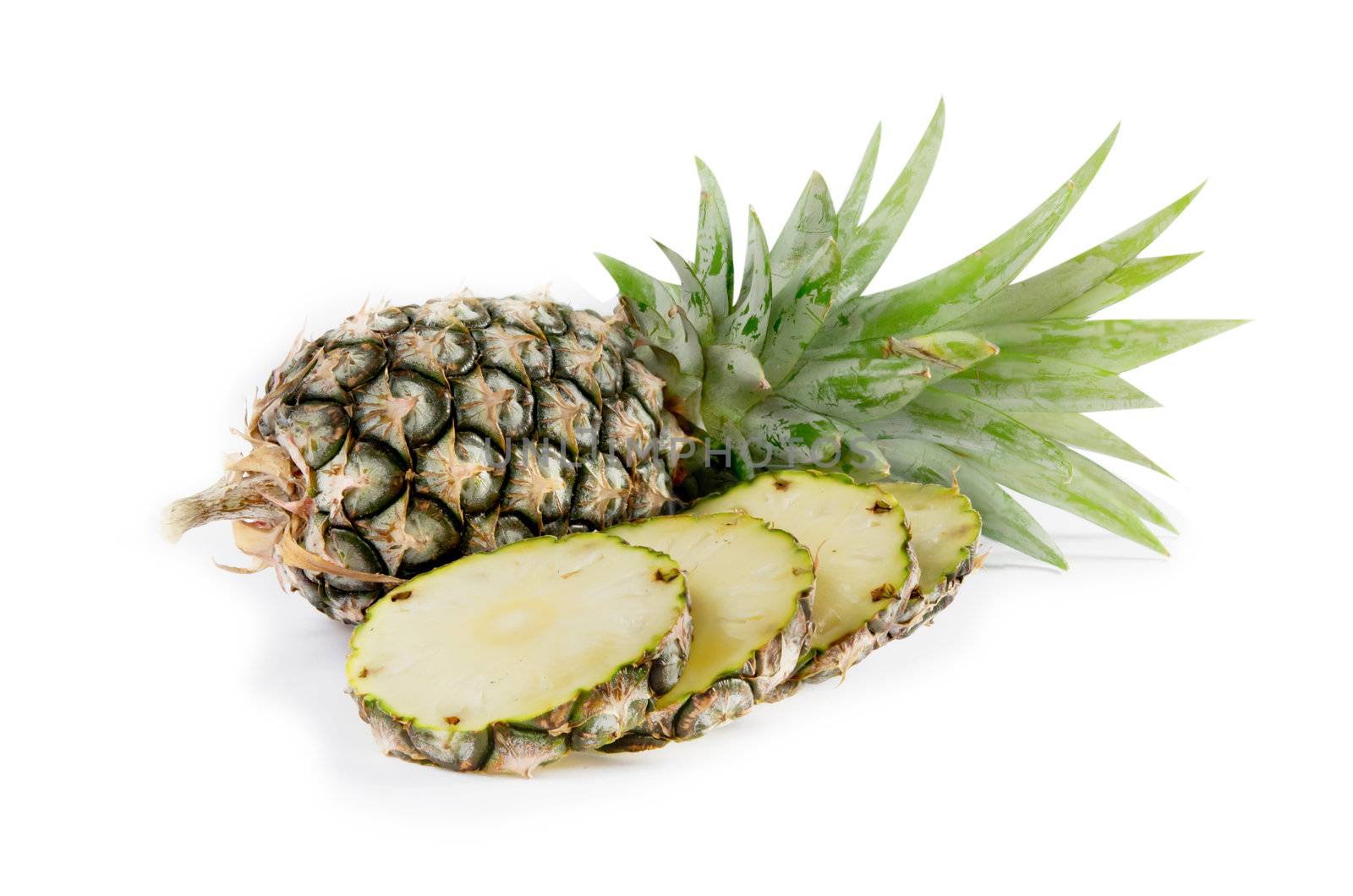 raw  pineapple and  sliced  pineapple  on white 